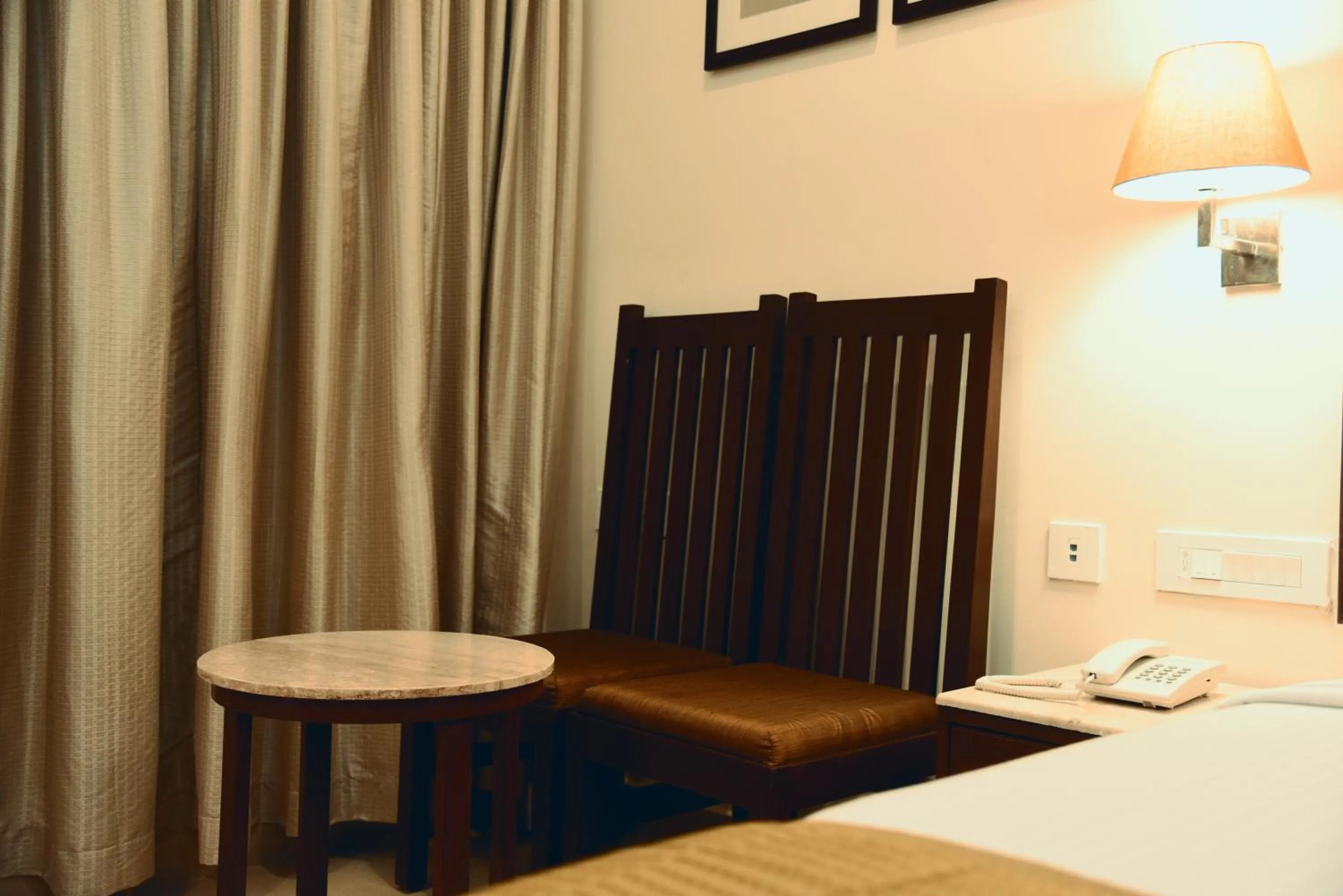 Bed in Hotel Rameswaram Grand