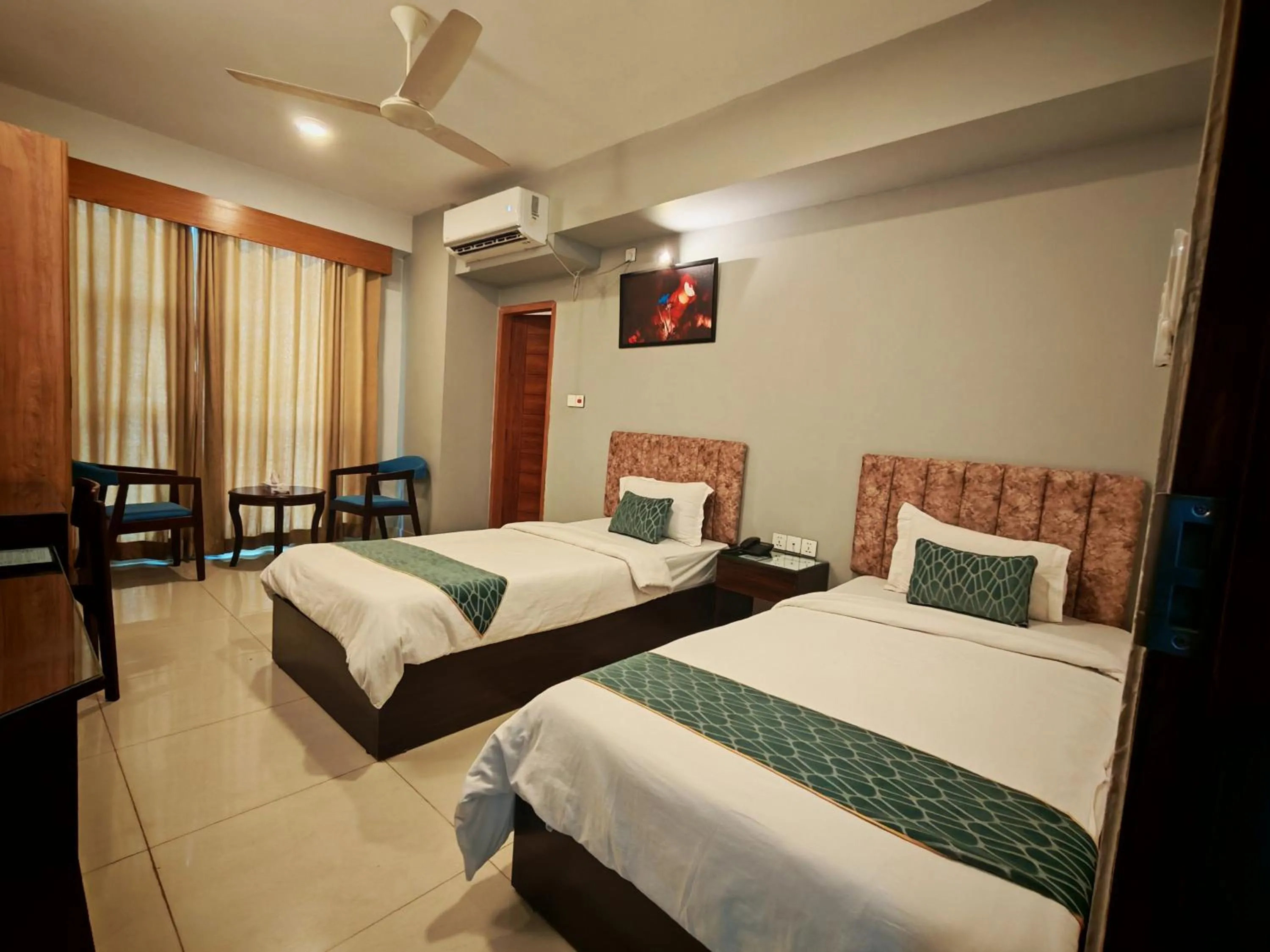 Bed in Sylhet Paradise Inn