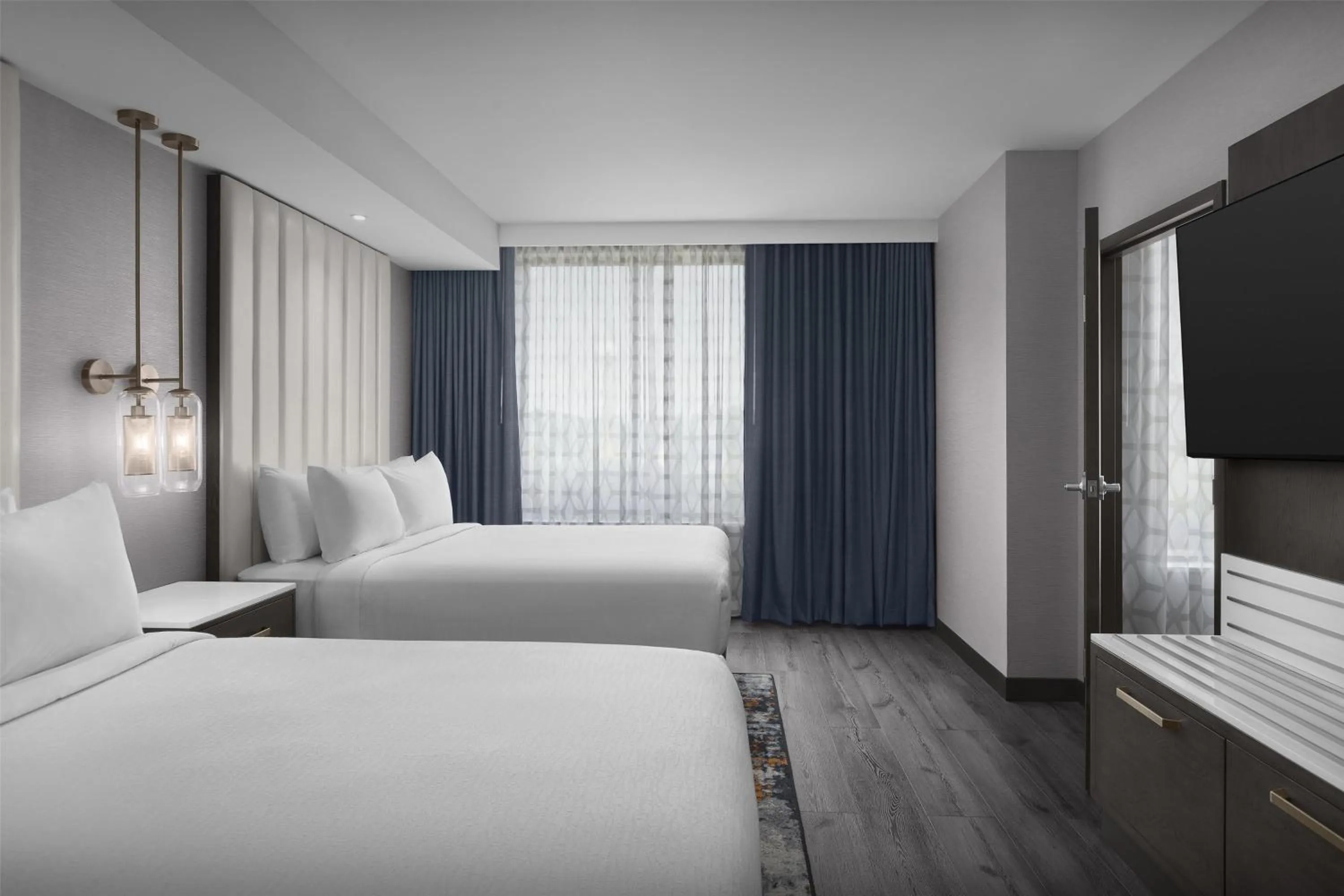 Bed in Embassy Suites By Hilton Pigeon Forge Resort