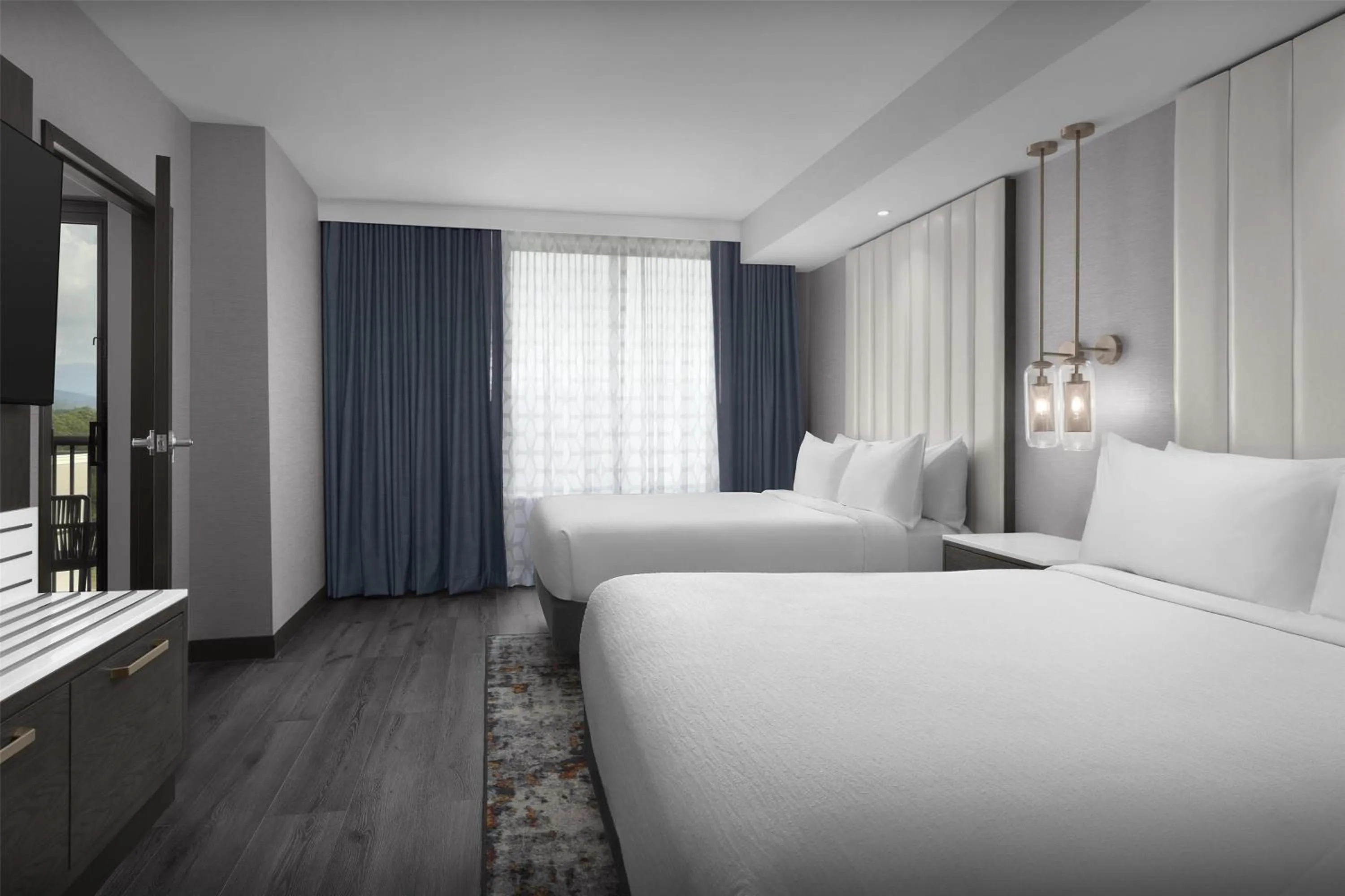 Bed in Embassy Suites By Hilton Pigeon Forge Resort