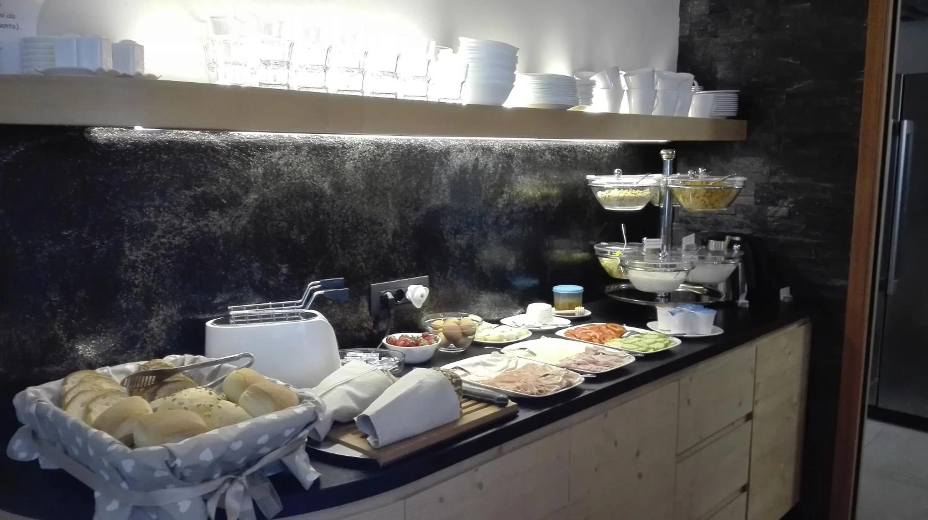 Buffet breakfast in Aparthotel Dolomites Living&Relax
