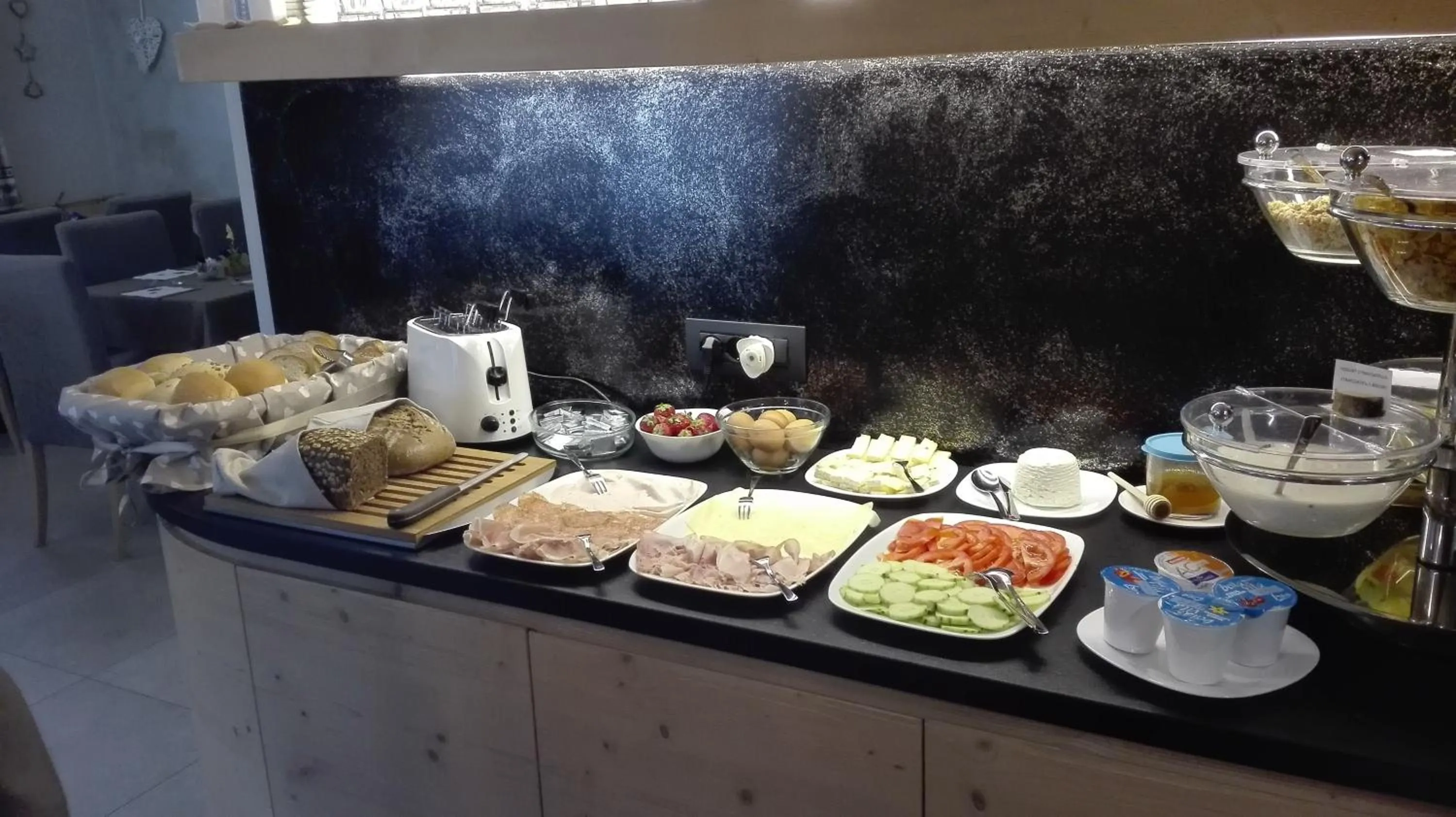 Buffet breakfast in Aparthotel Dolomites Living&Relax