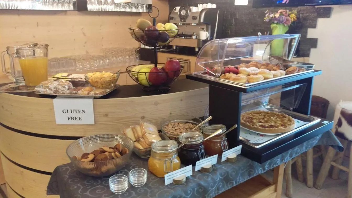 Buffet breakfast in Aparthotel Dolomites Living&Relax