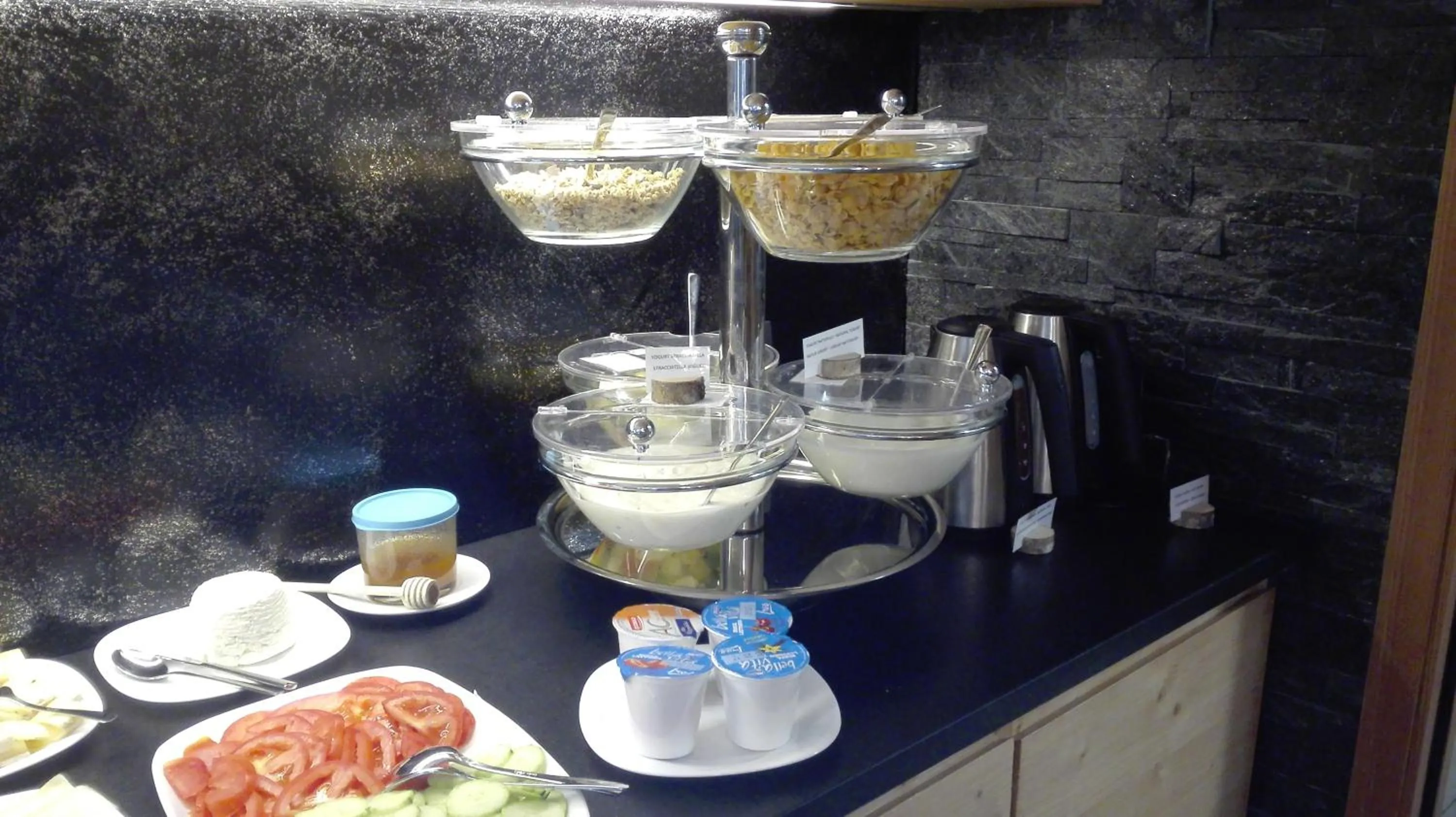 Buffet breakfast in Aparthotel Dolomites Living&Relax
