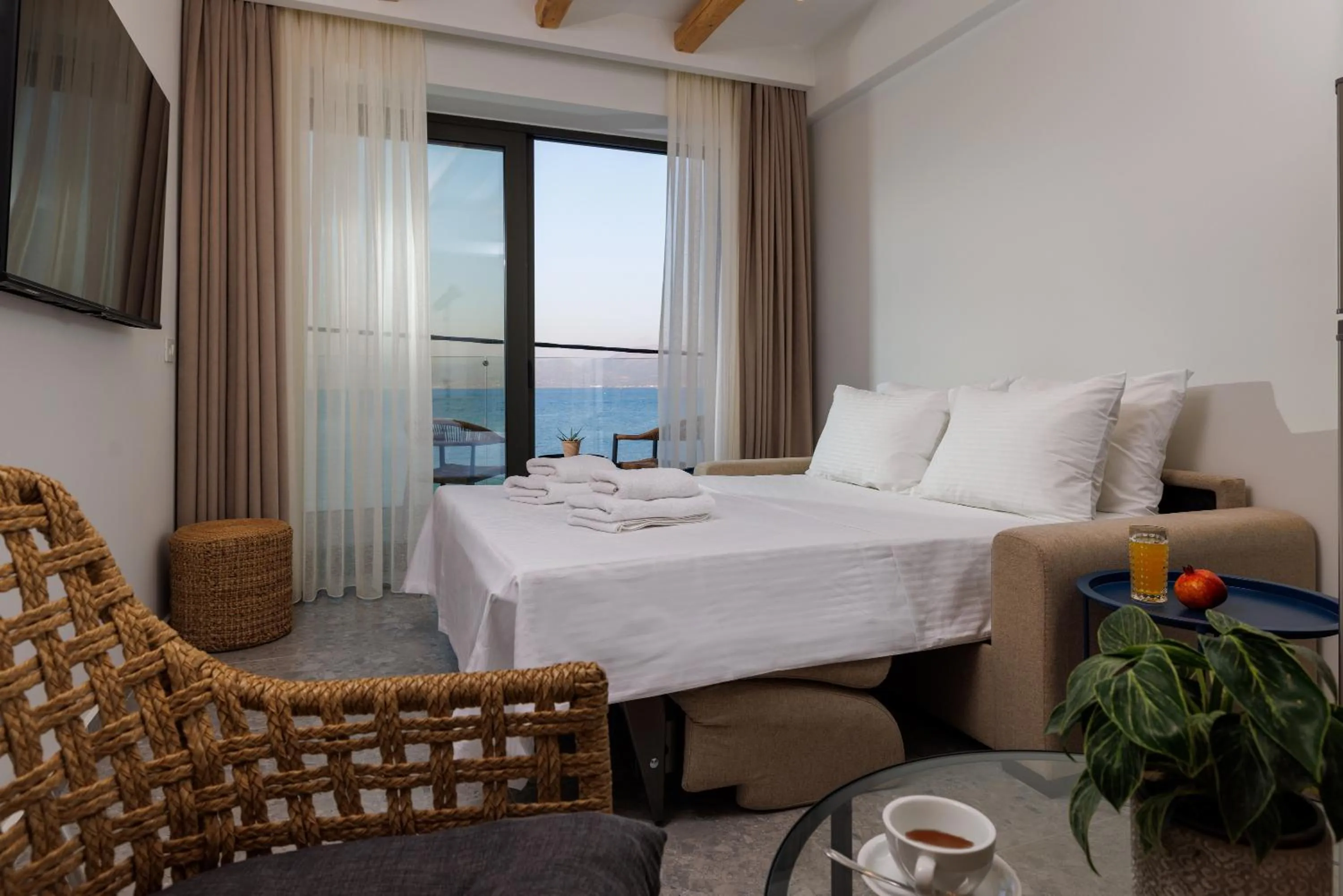 Photo of the whole room, Bed in Soho SeaFront Suites