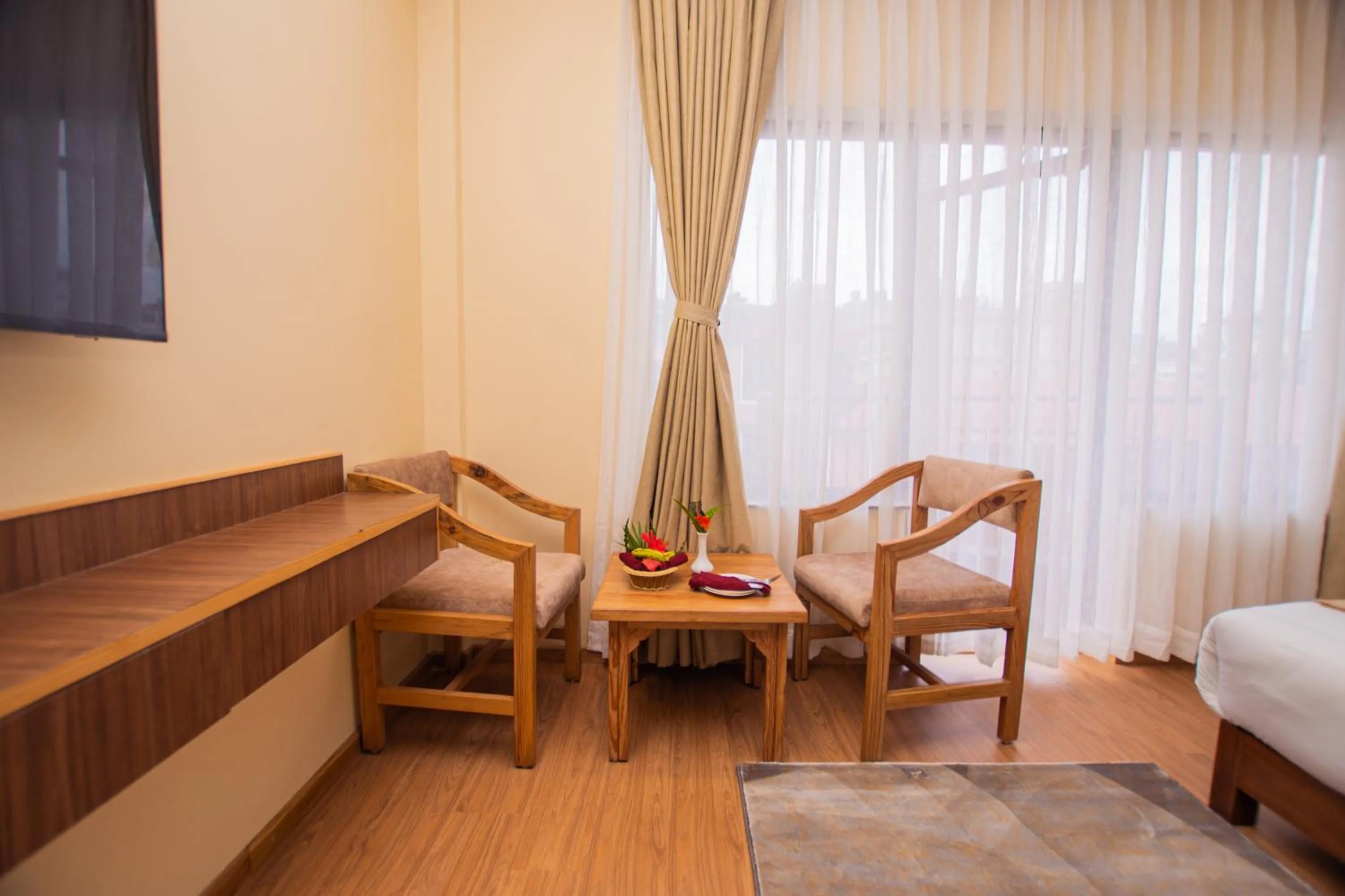Seating area, Bed in Temple Himalaya Hotel & Spa