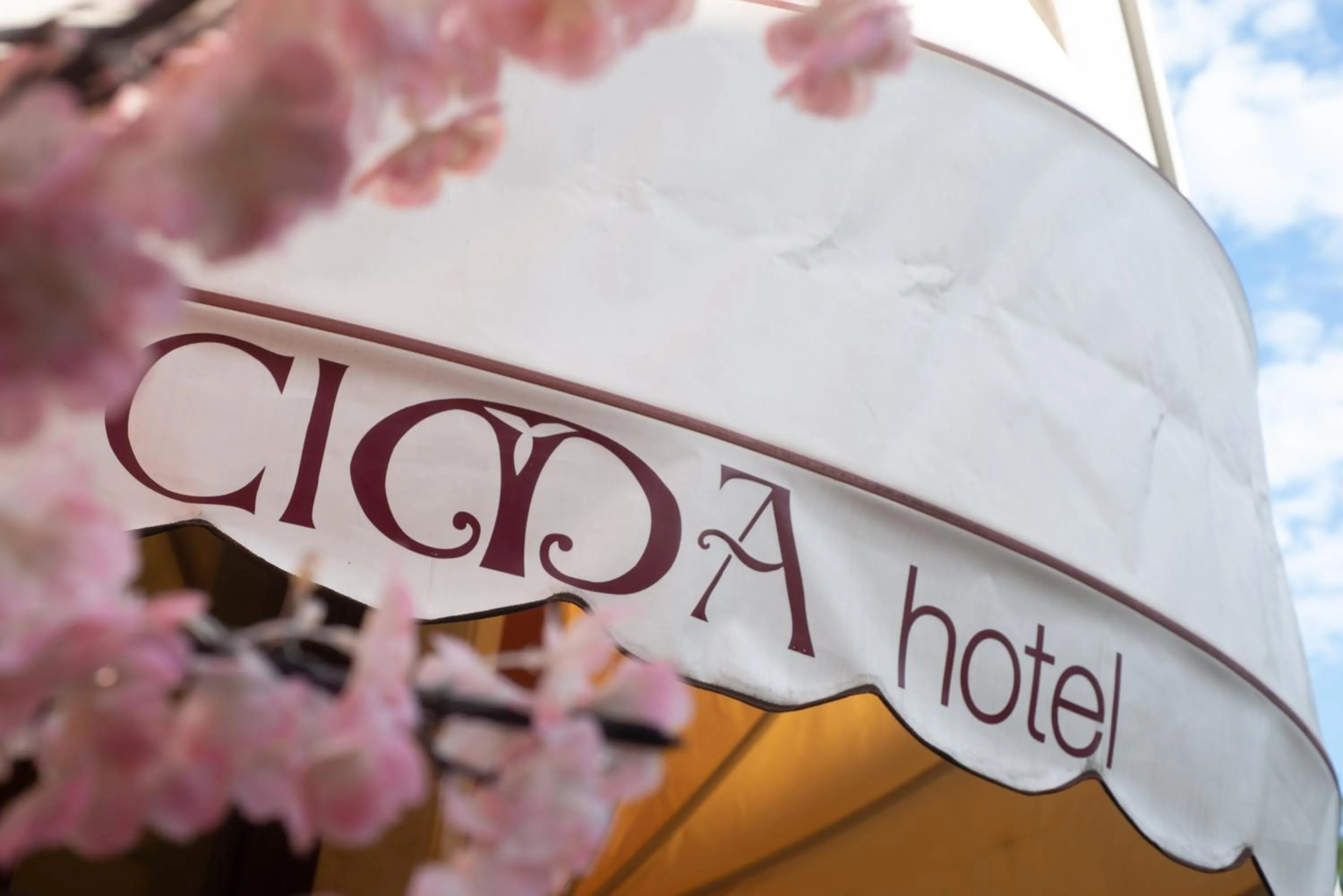 Property logo or sign in Hotel Cima