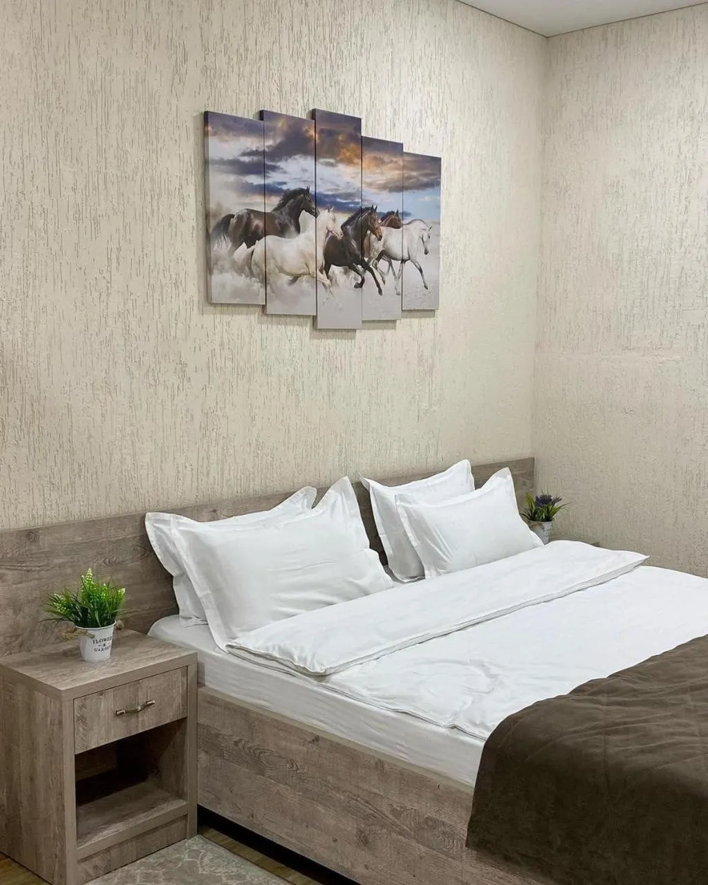 Bed in Deluxe SPA-Hotel