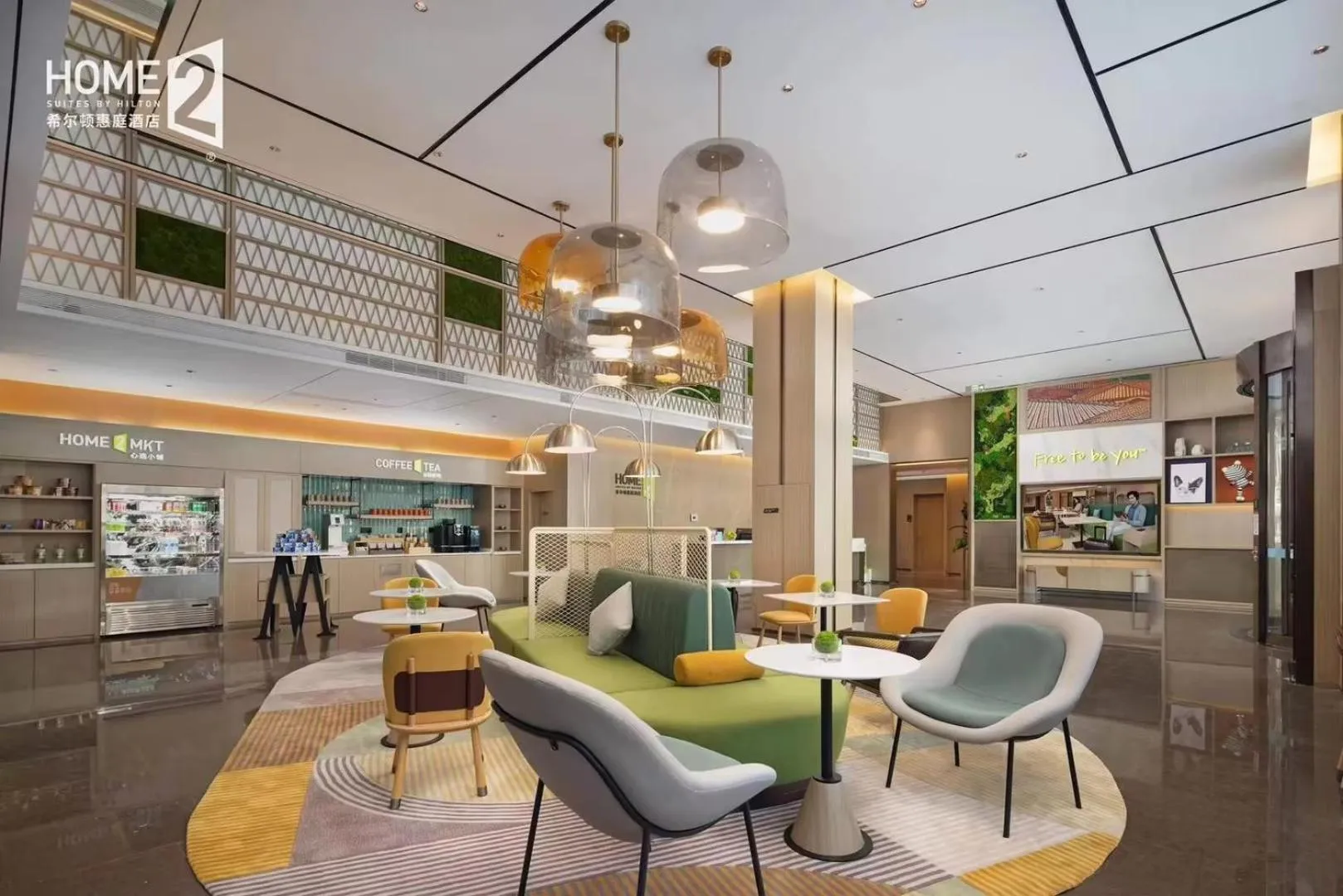 Seating area in Home2 Suite by Meishan Dongpo