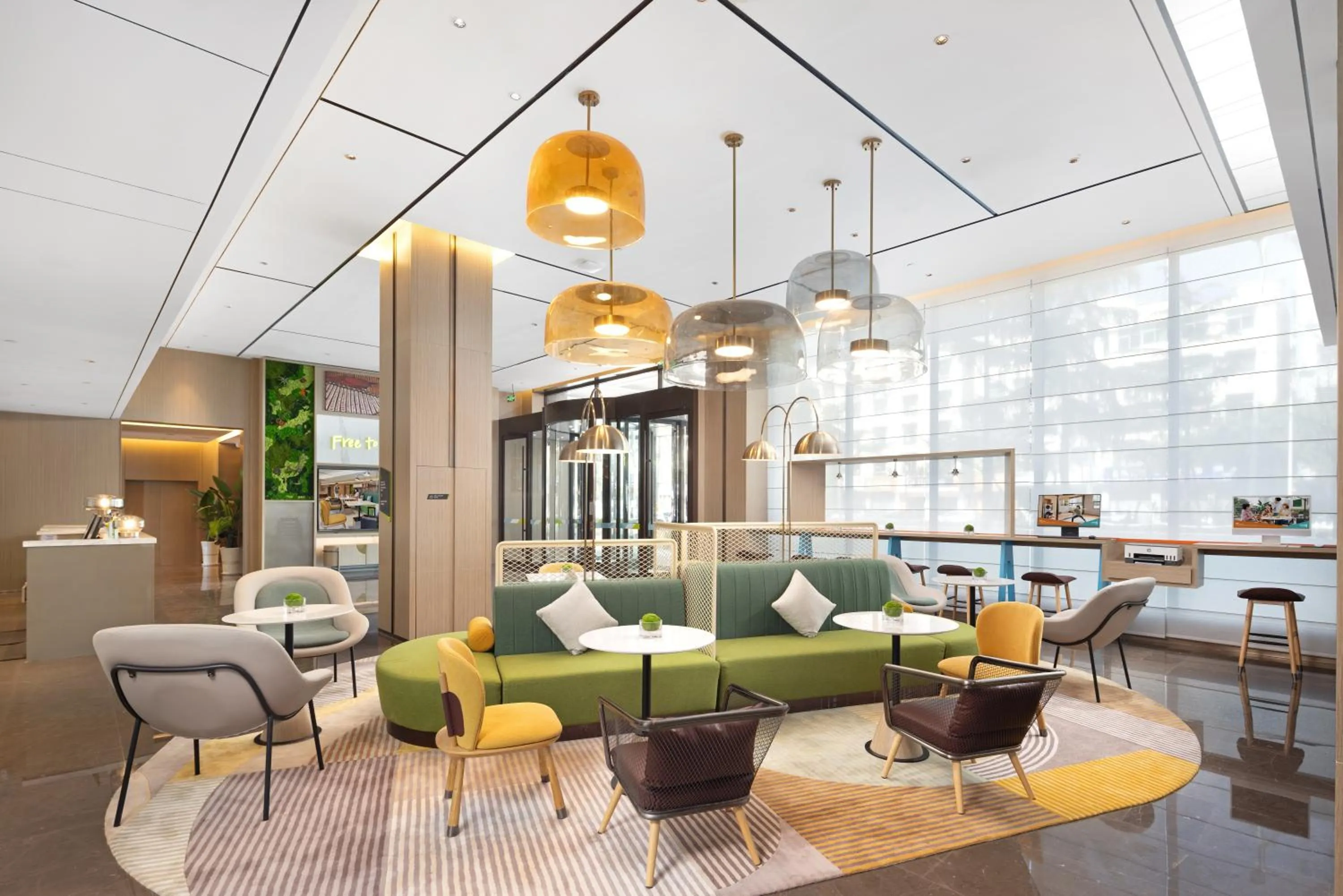 Communal lounge/ TV room in Home2 Suite by Meishan Dongpo