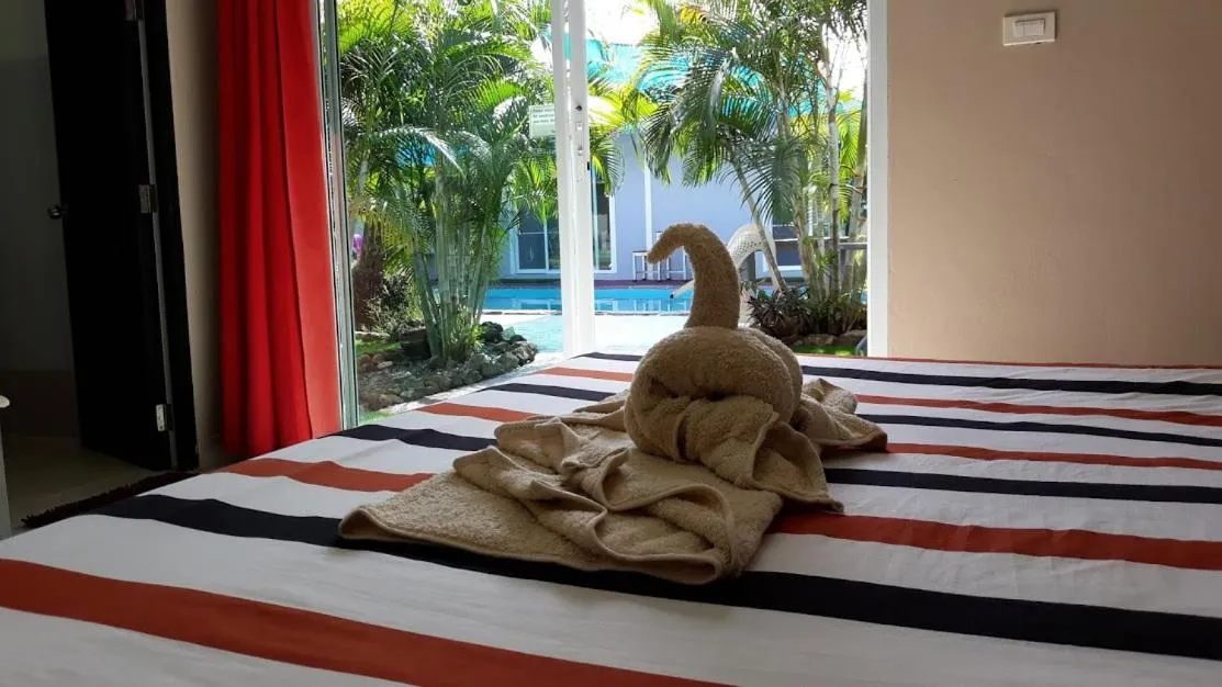 Bed in Carpe Diem Guest House