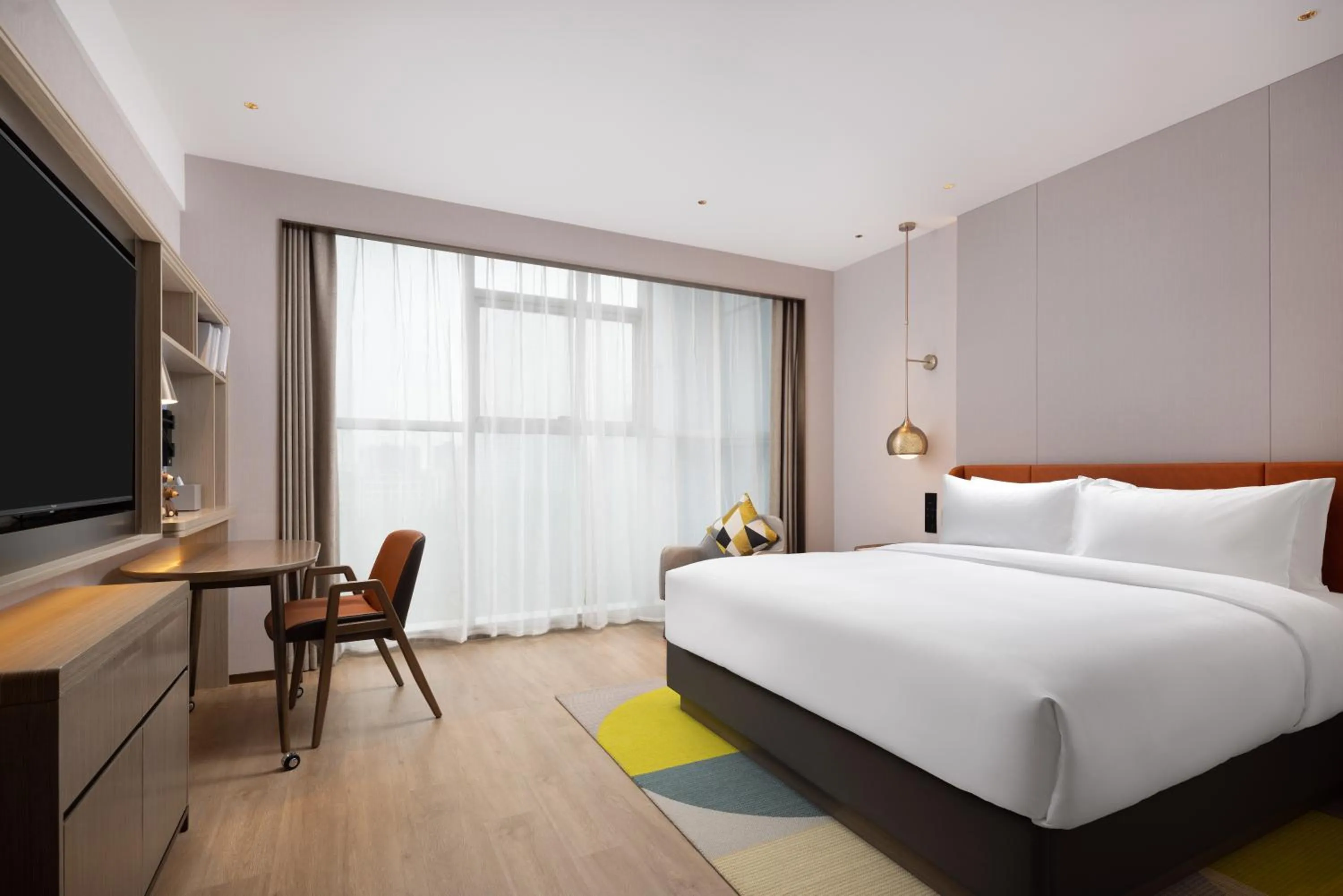 Seating area, Bed in Home2 Suite by Hilton East Handan Station