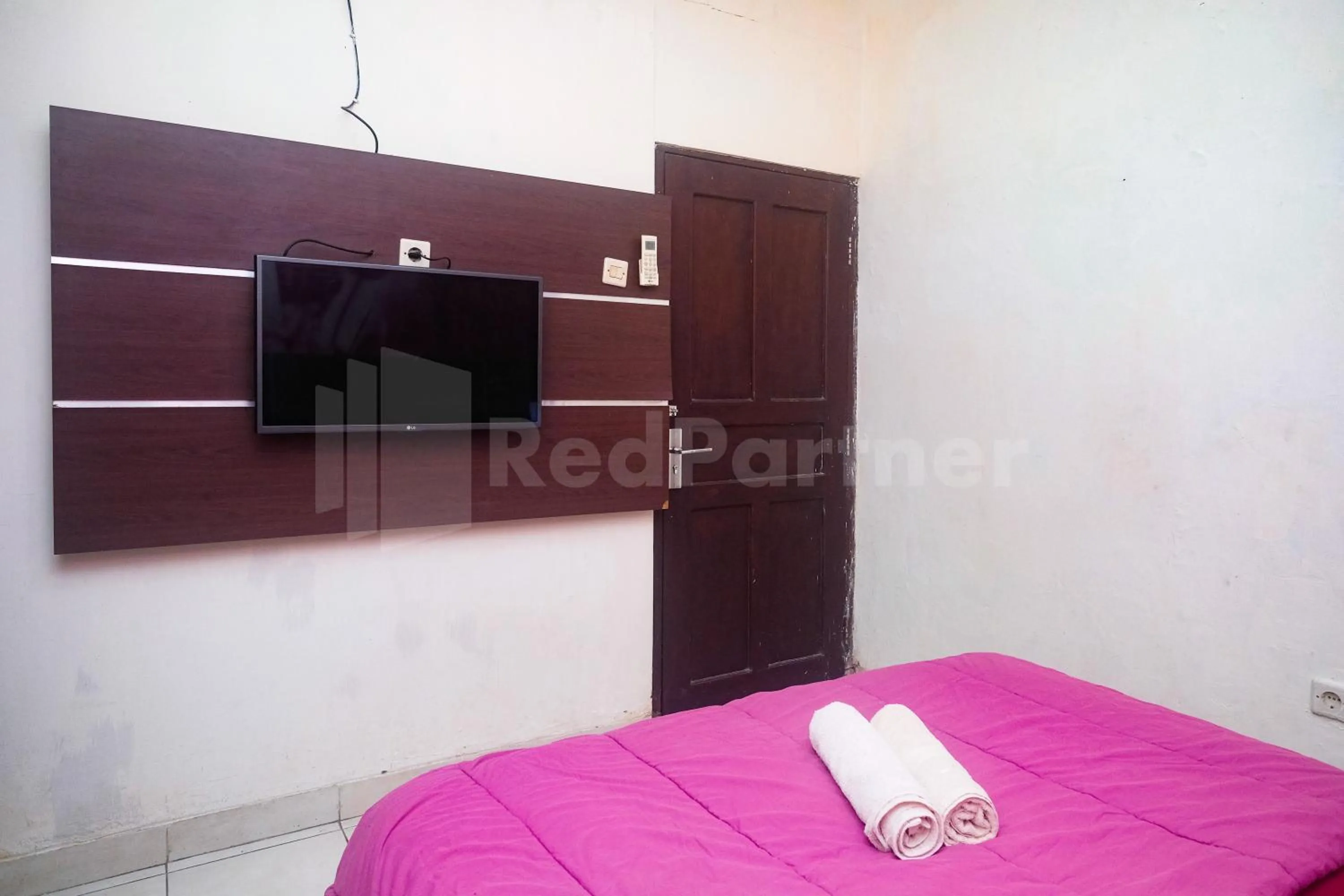 Bedroom, Bed in Bies Malioboro Hotel RedPartner