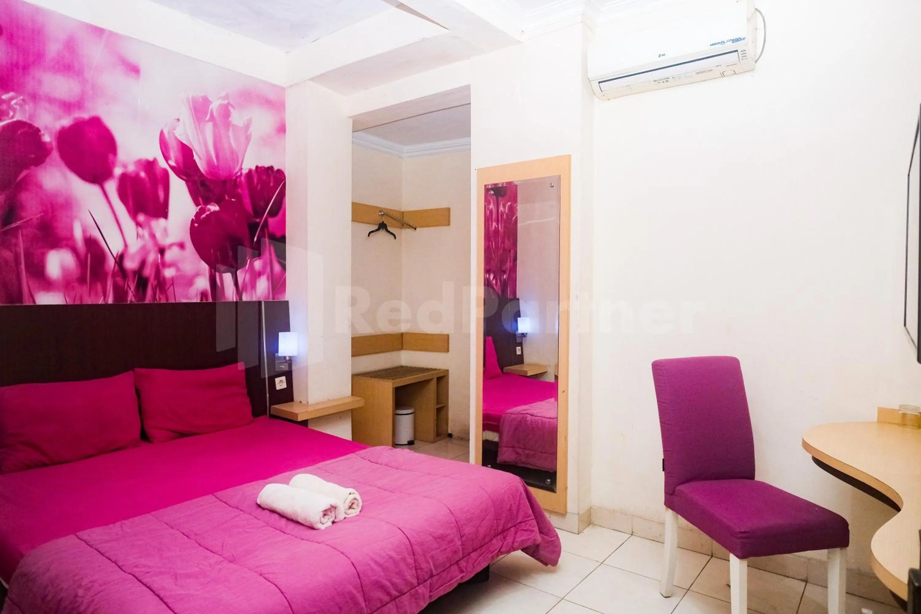 Bedroom, Bed in Bies Malioboro Hotel RedPartner