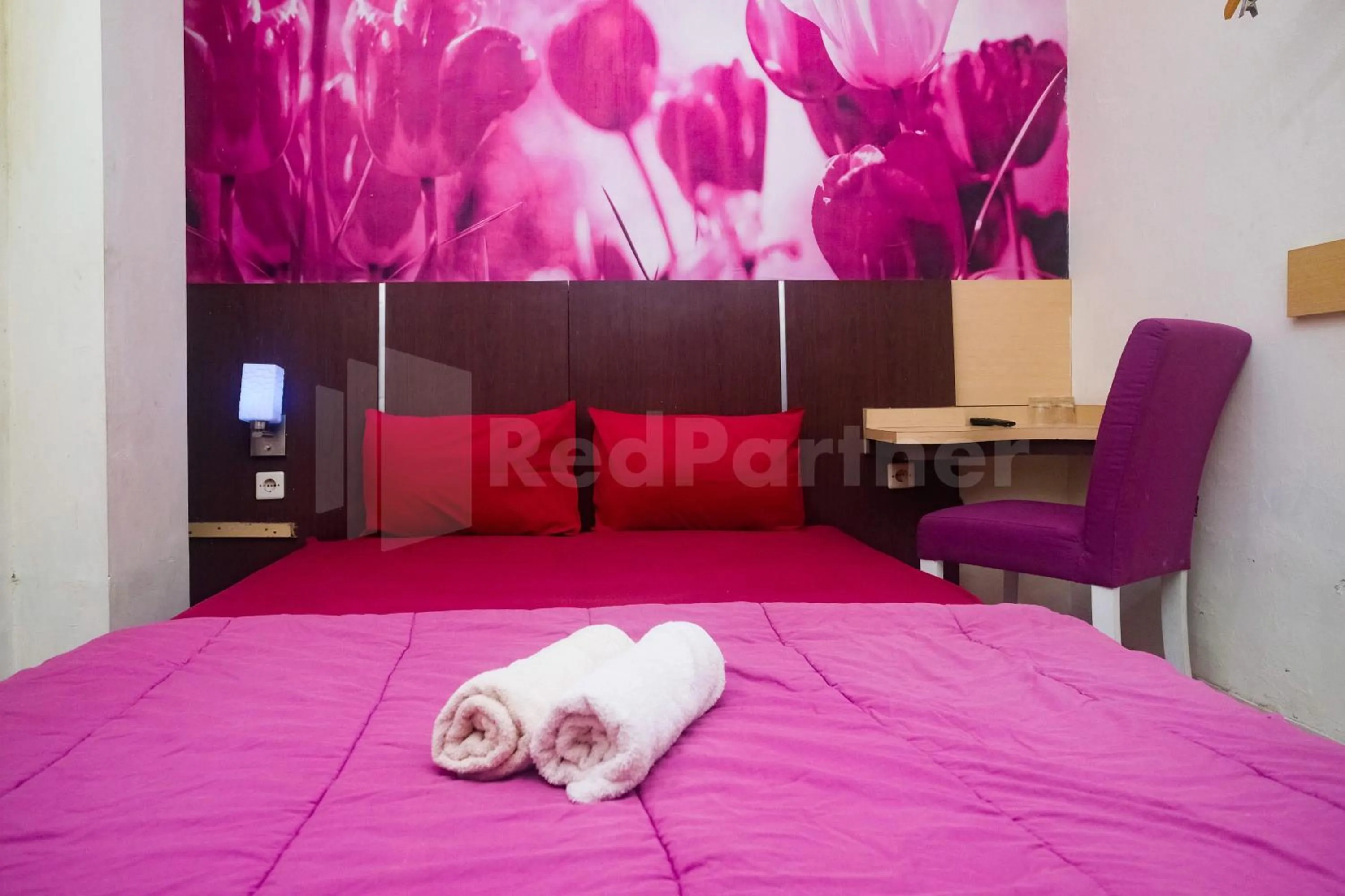 Bedroom, Bed in Bies Malioboro Hotel RedPartner