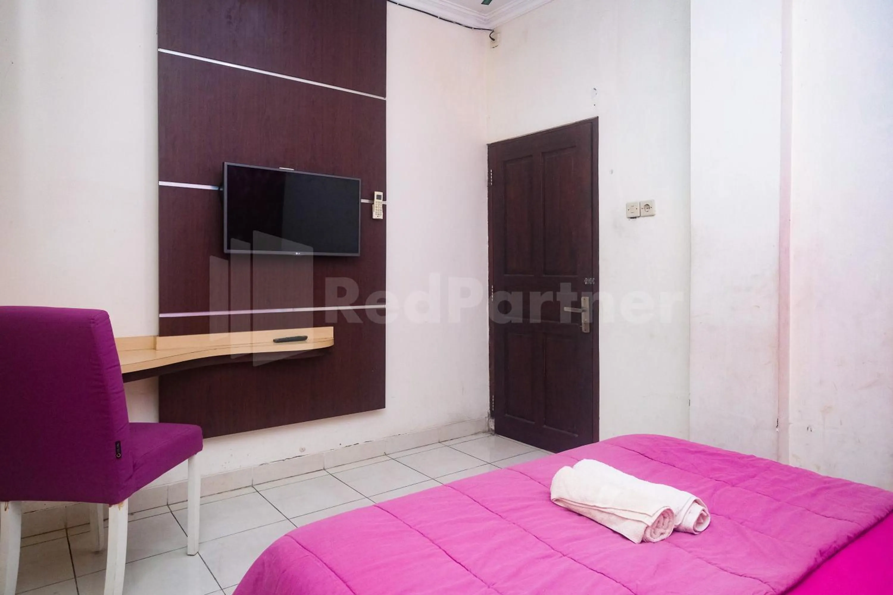 Bedroom, Bed in Bies Malioboro Hotel RedPartner