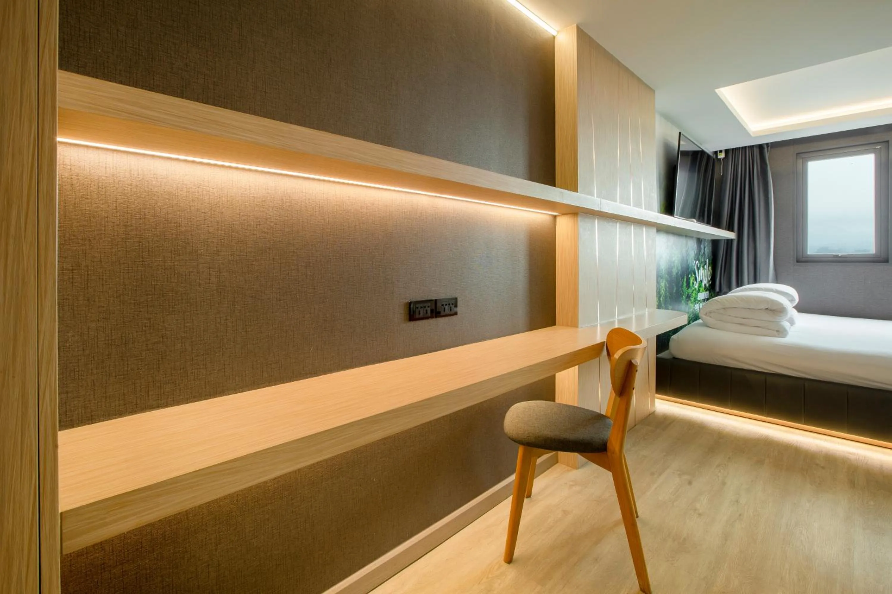 Seating area, Bed in Pino Latte Khao Kho