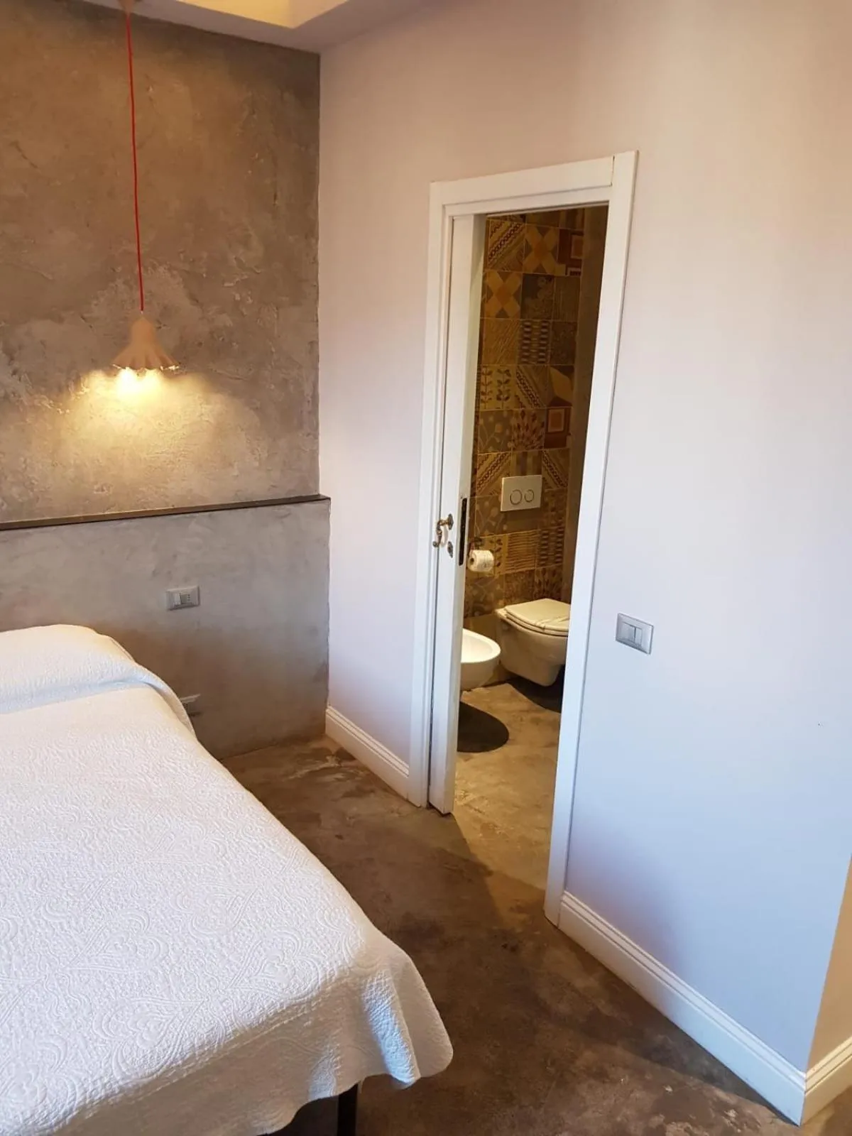 Bedroom in Affittacamere Joss