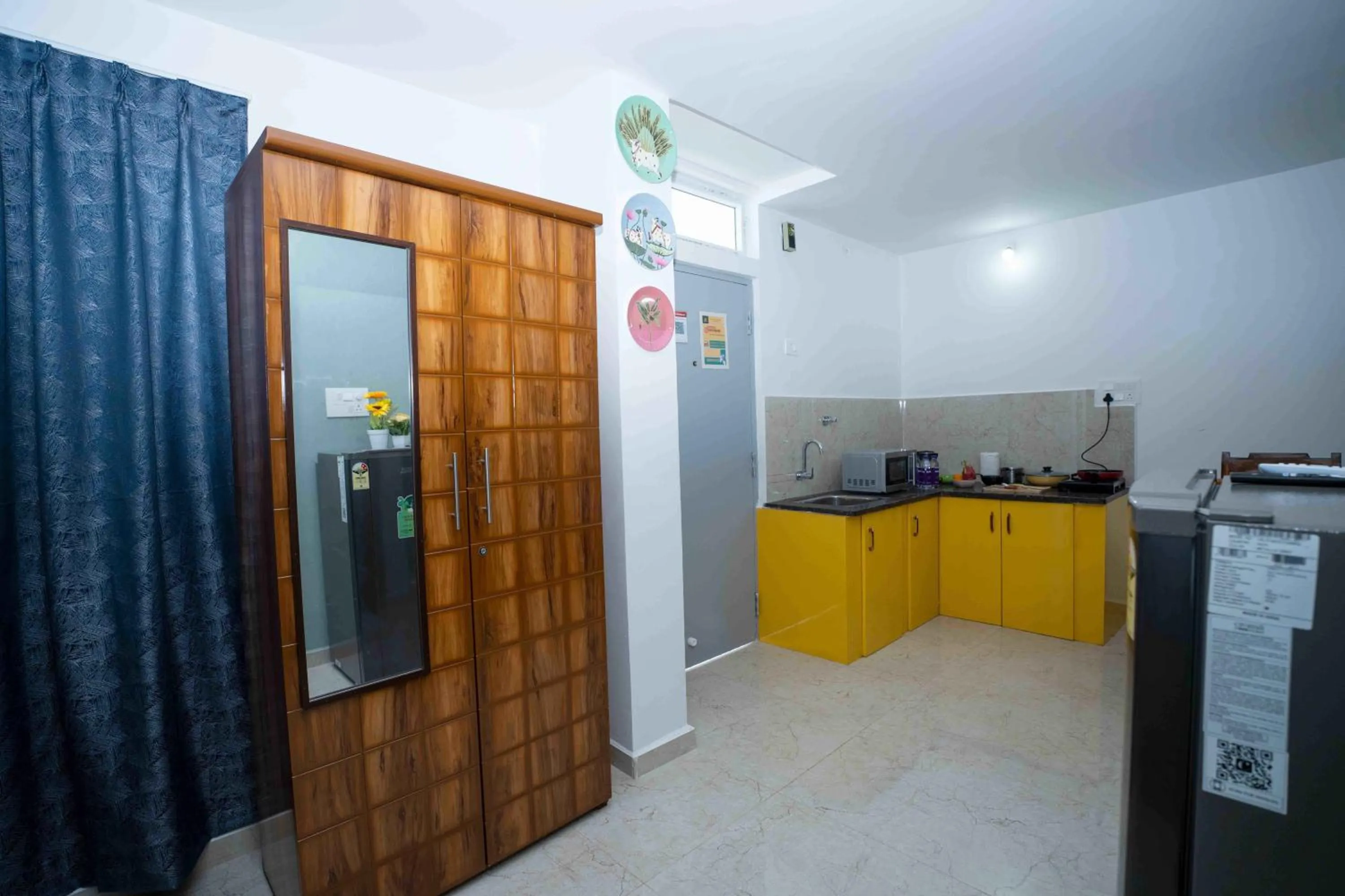 Kitchen or kitchenette in Yellow Bells Studios And Suites
