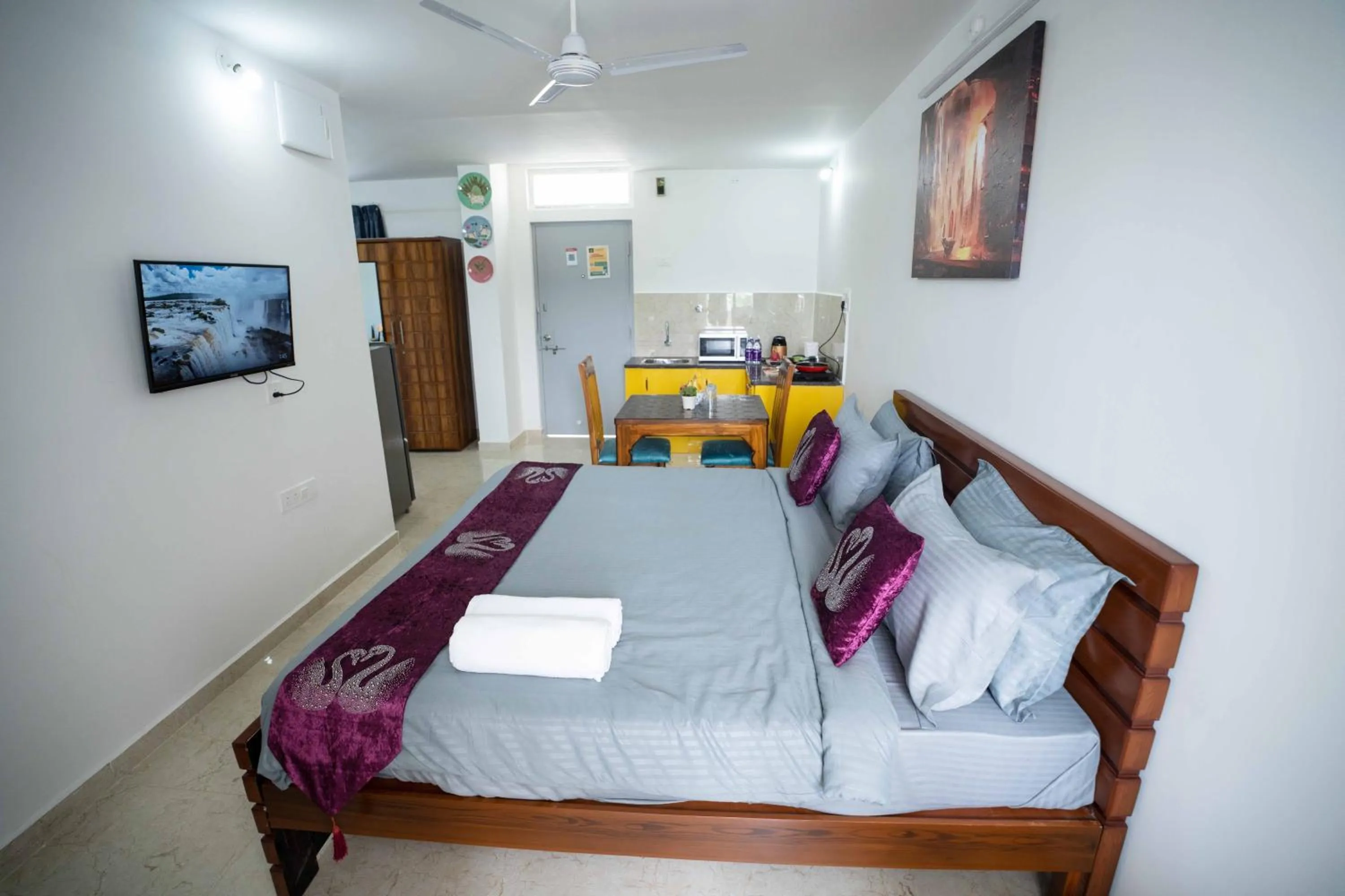 Photo of the whole room, Bed in Yellow Bells Studios And Suites