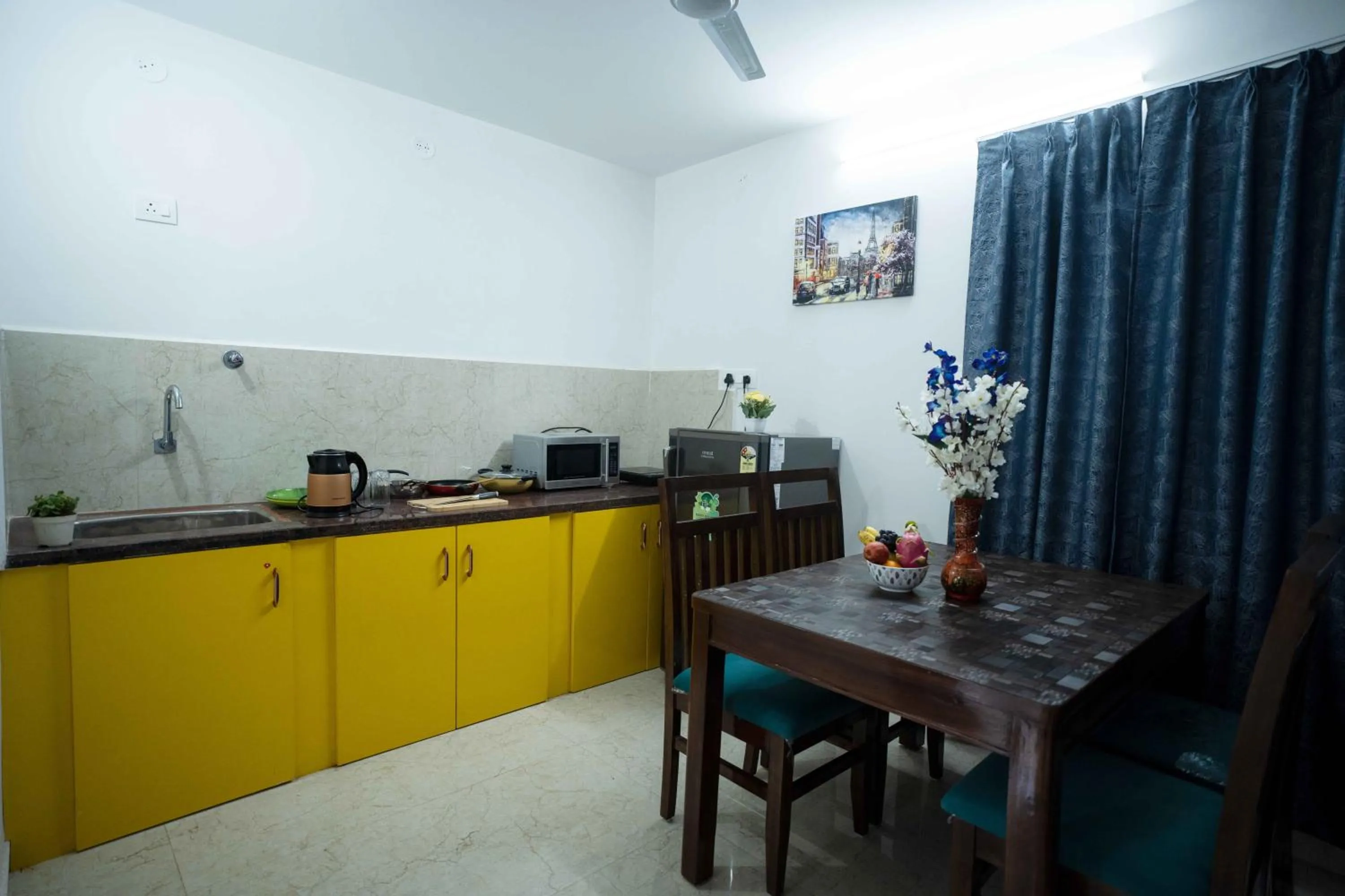 Kitchen or kitchenette in Yellow Bells Studios And Suites