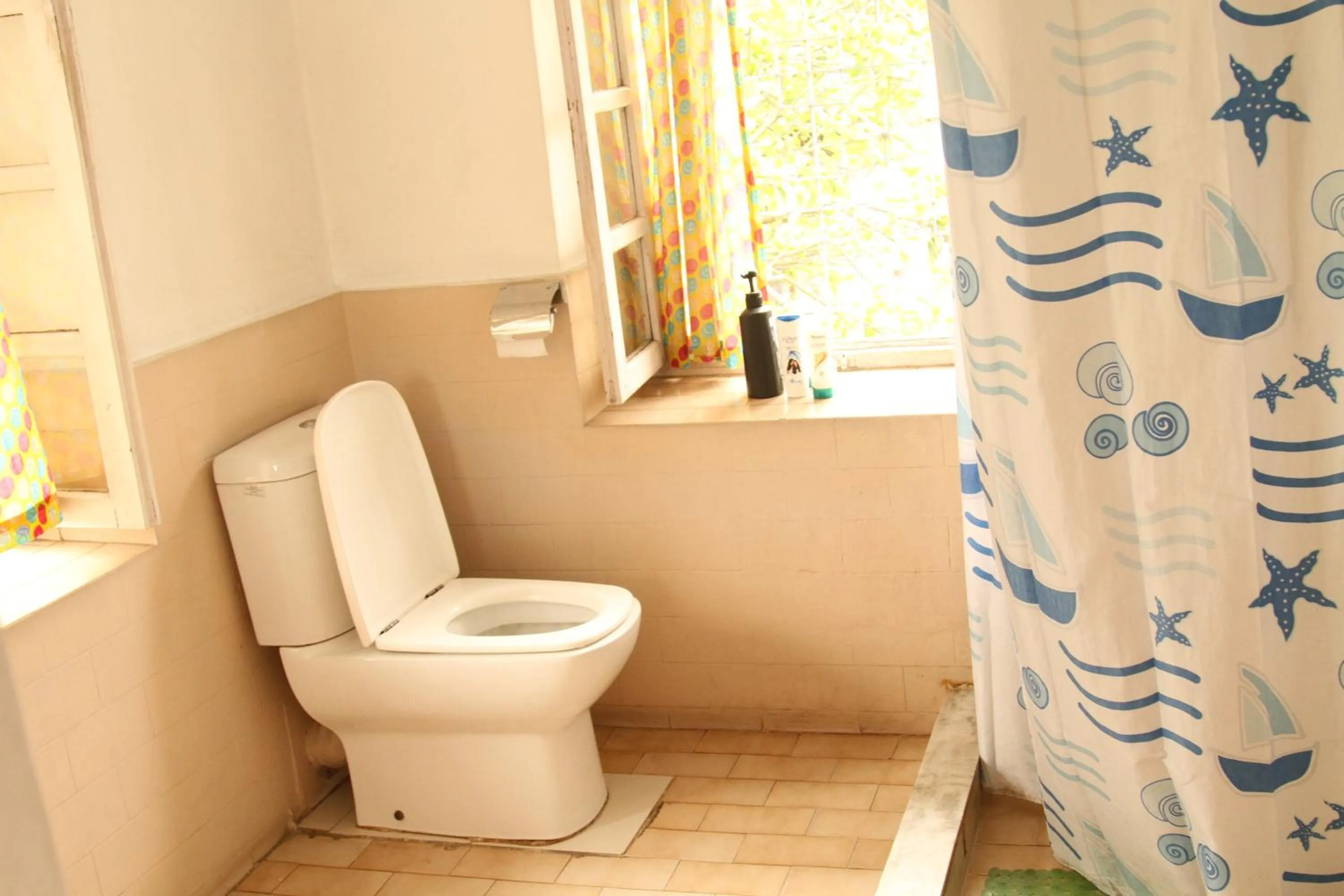 Toilet in Cocina Mitho Chha BNB