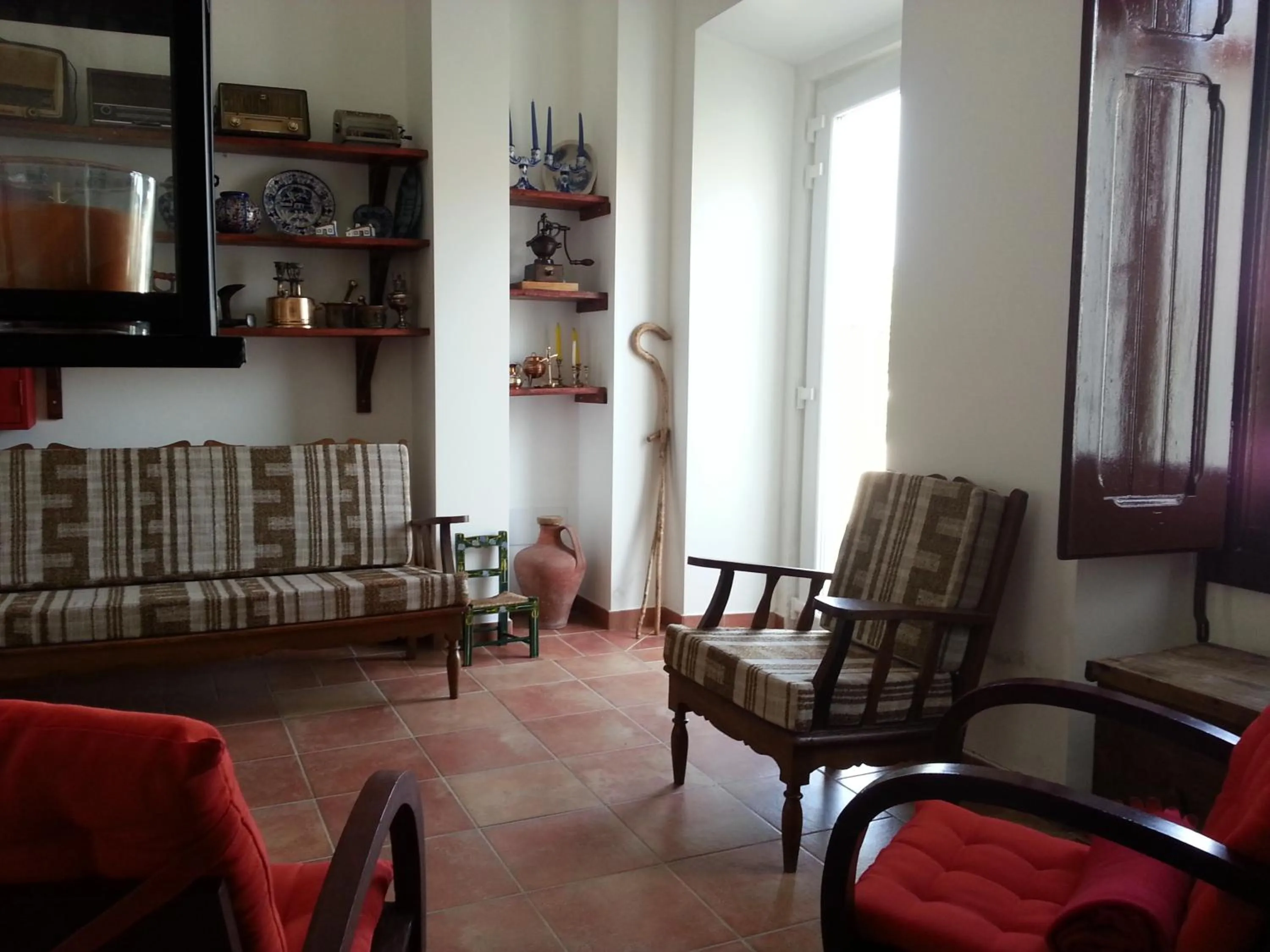 Communal lounge/ TV room in Casas da Moagem