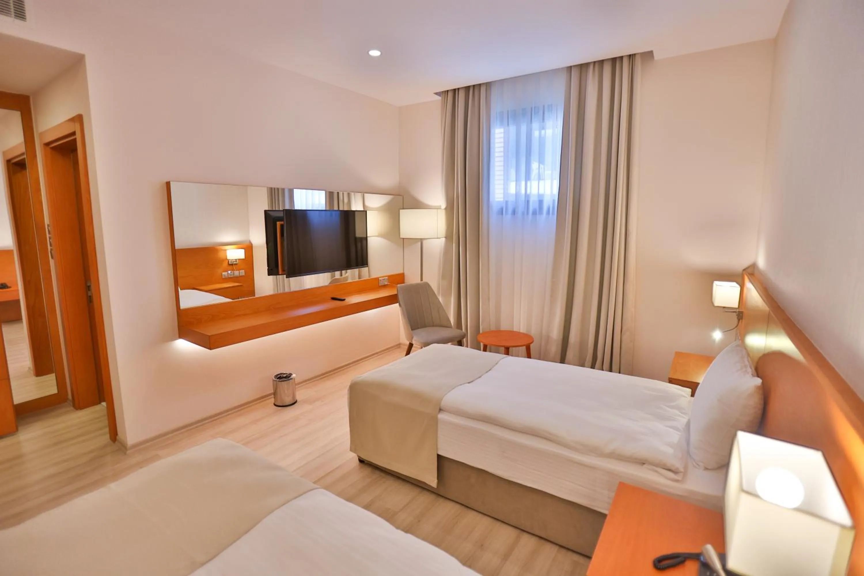 Bed in Caddem Inn Hotel