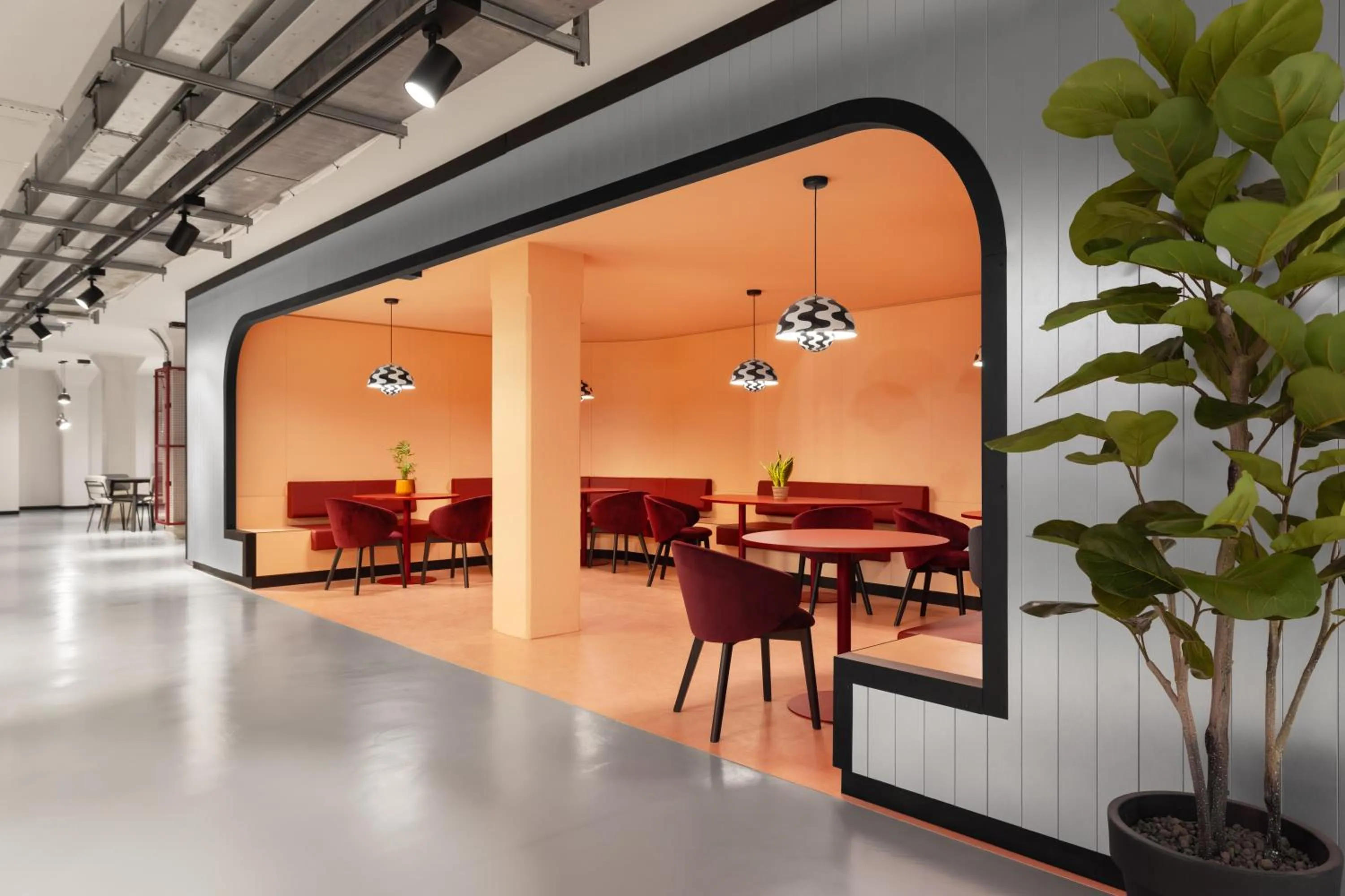 Seating area in CX Milan Bicocca