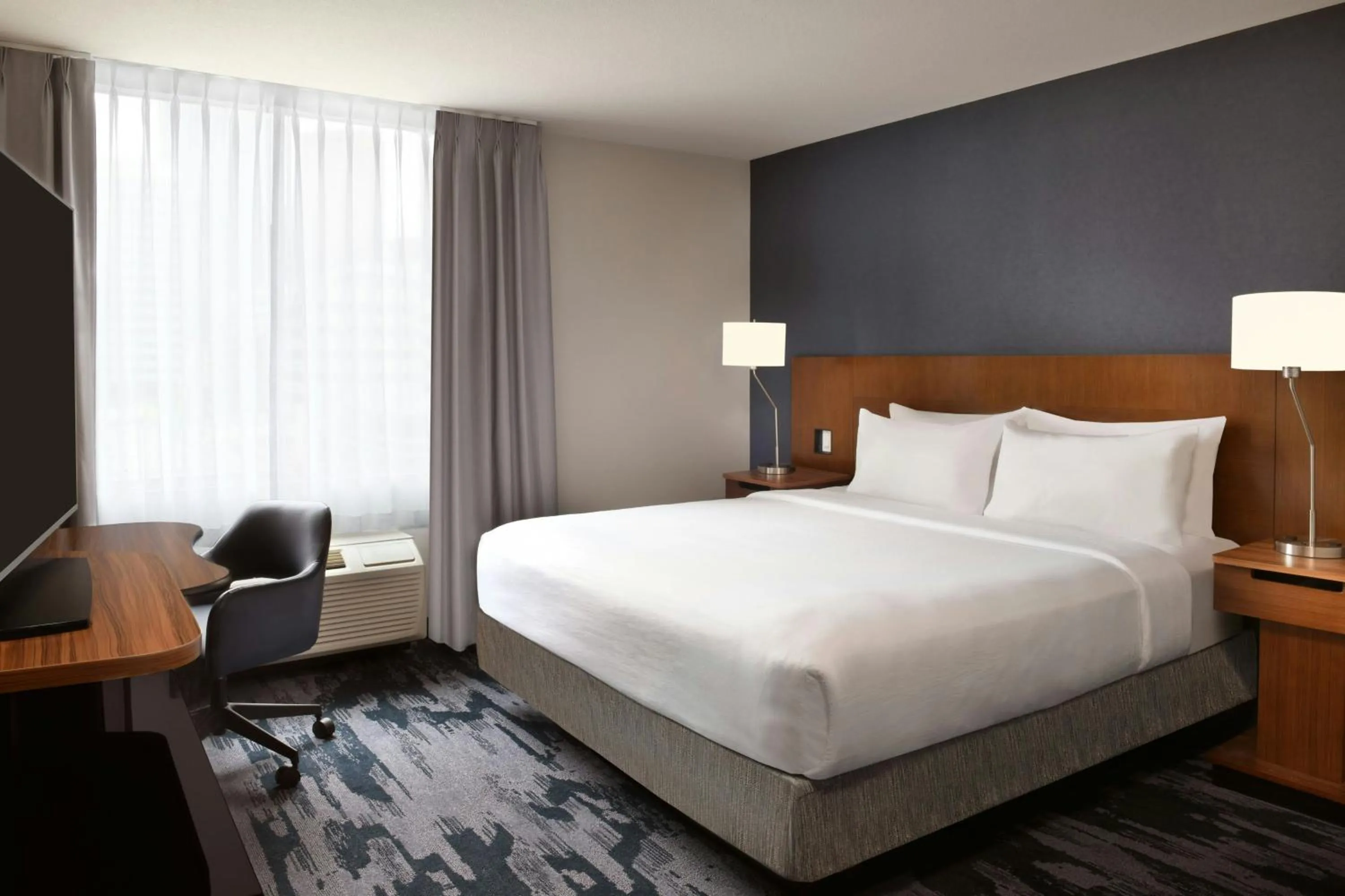 Photo of the whole room, Bed in Fairfield Inn & Suites by Marriott Calgary Downtown
