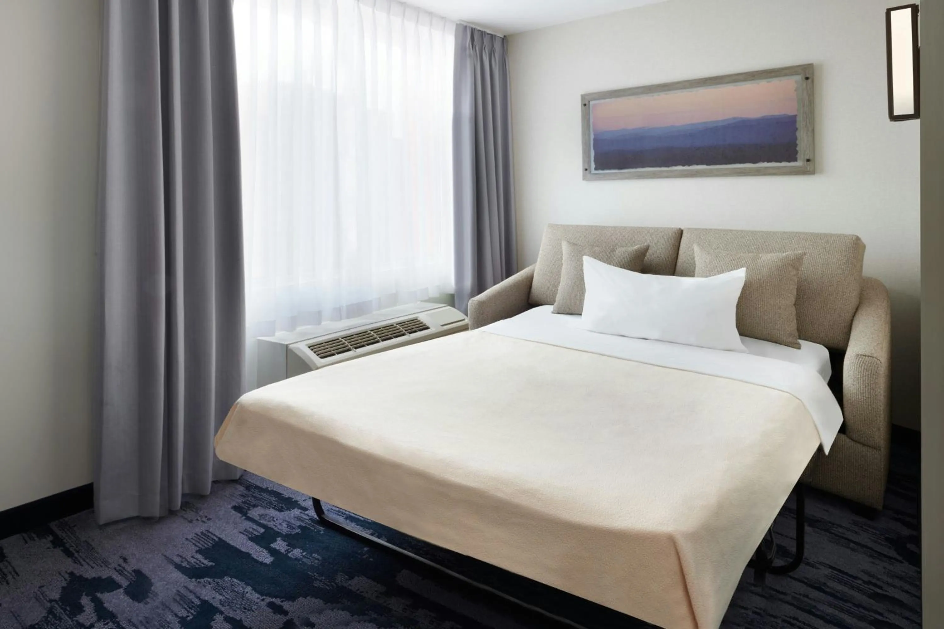 Photo of the whole room, Bed in Fairfield Inn & Suites by Marriott Calgary Downtown