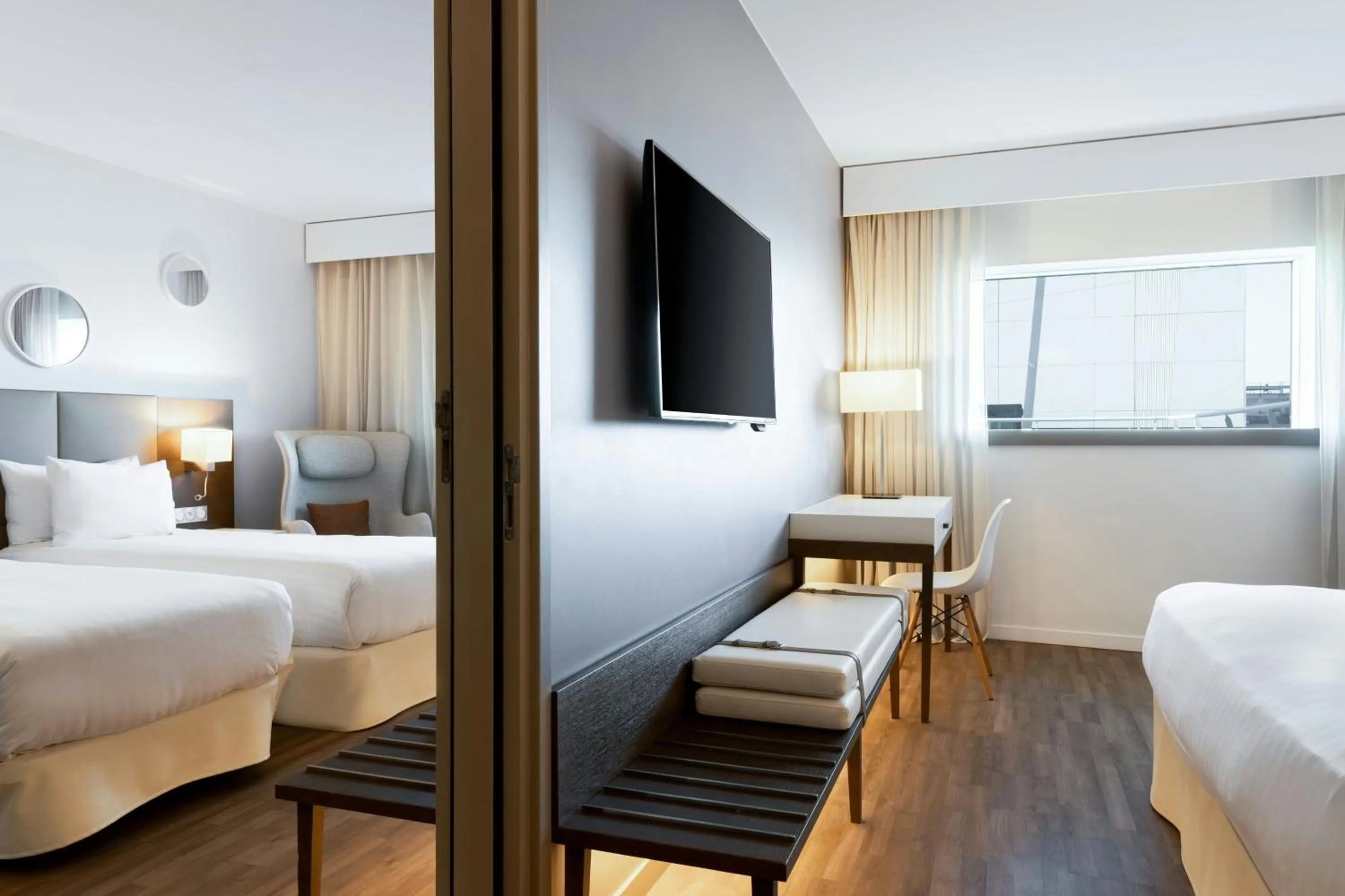 Photo of the whole room, Bed in AC Hotel by Marriott Paris Le Bourget Airport
