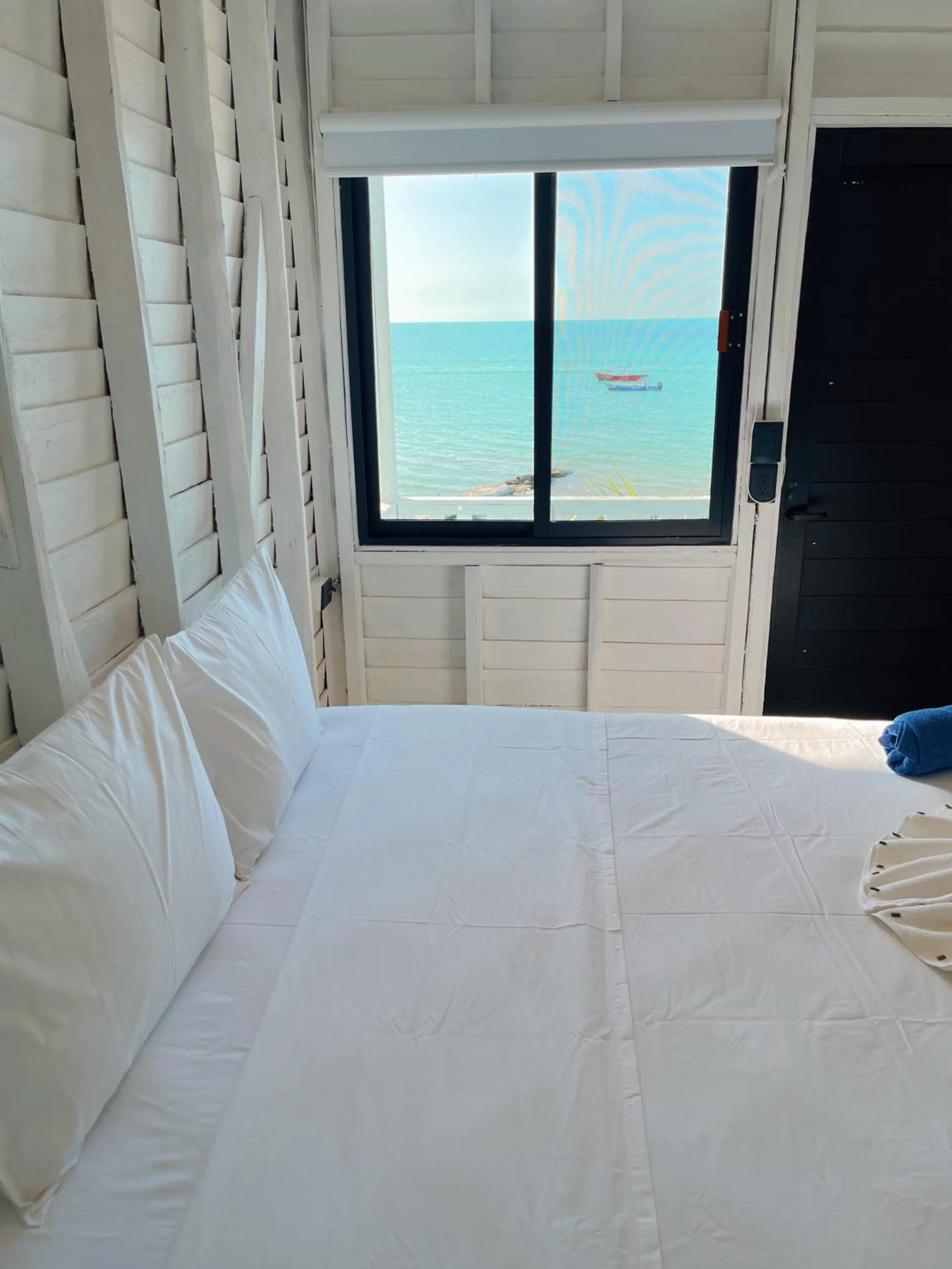 Bed in El Faro Beach Front by ÓOL Hotels