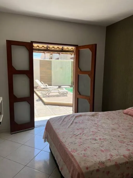 Bed in Casa com piscina, churrasqueira e ar condicionado em condomínio