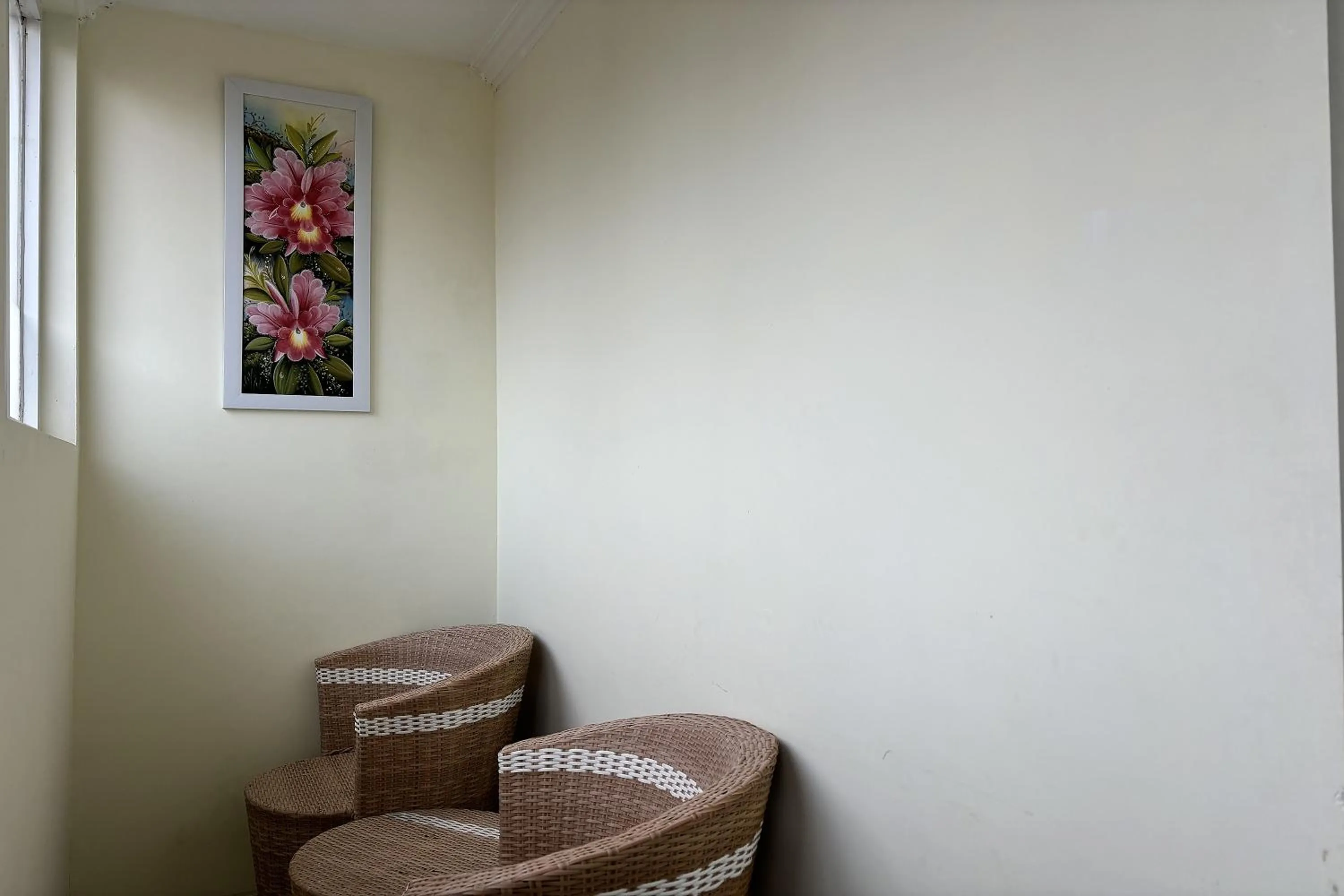 Seating area in Green Hero Darajat Hotel