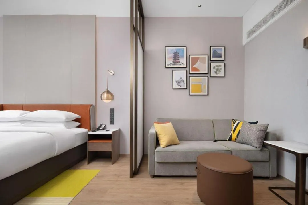 Bed in Home2 Suite by Hilton Yantai Laishan