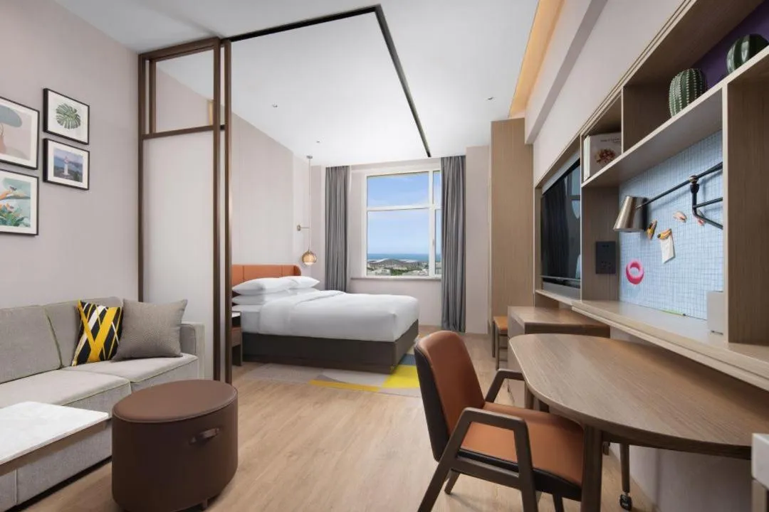 Bed in Home2 Suite by Hilton Yantai Laishan