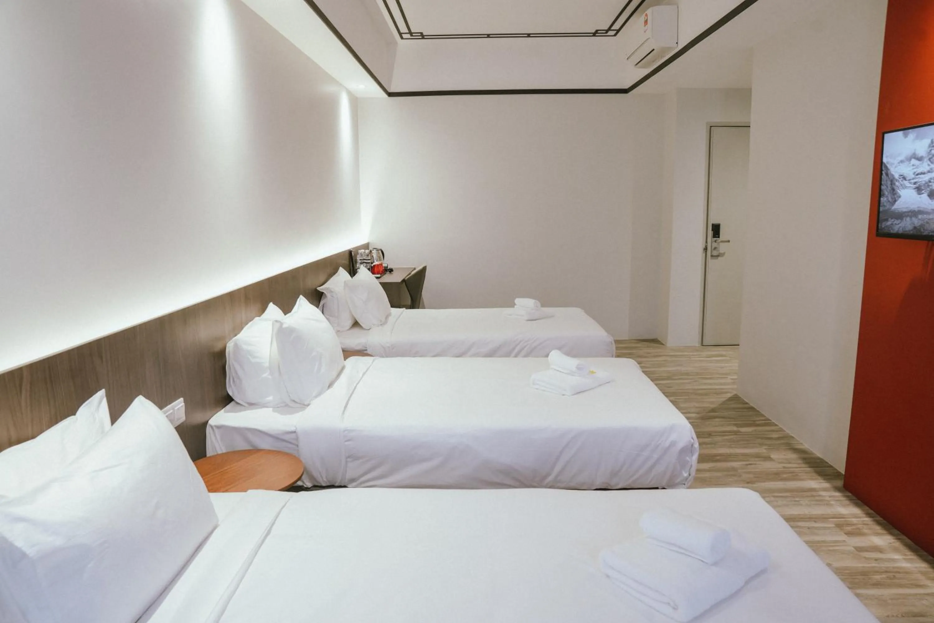 Bed in Roxy Hotel Siniawan