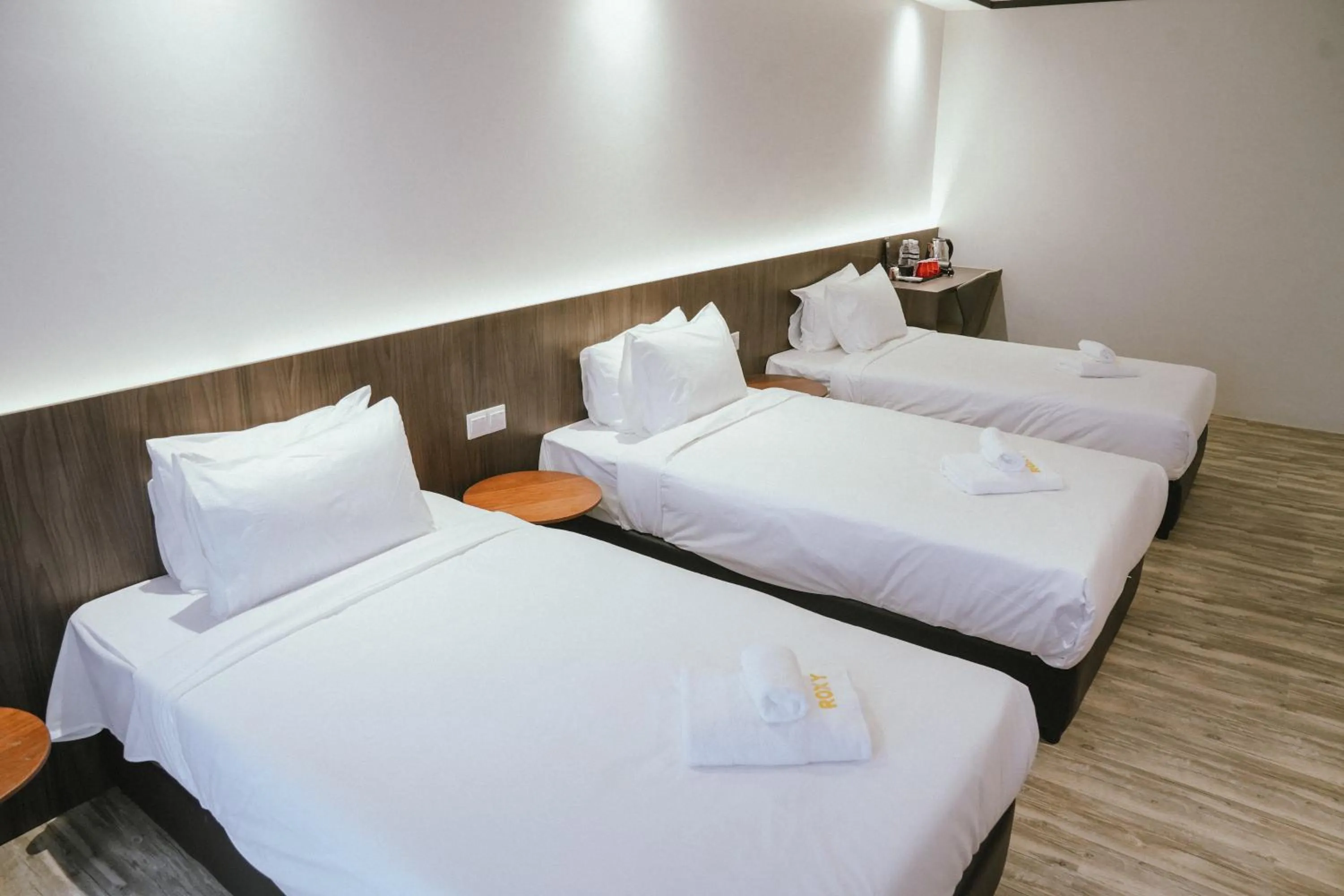 Bed in Roxy Hotel Siniawan