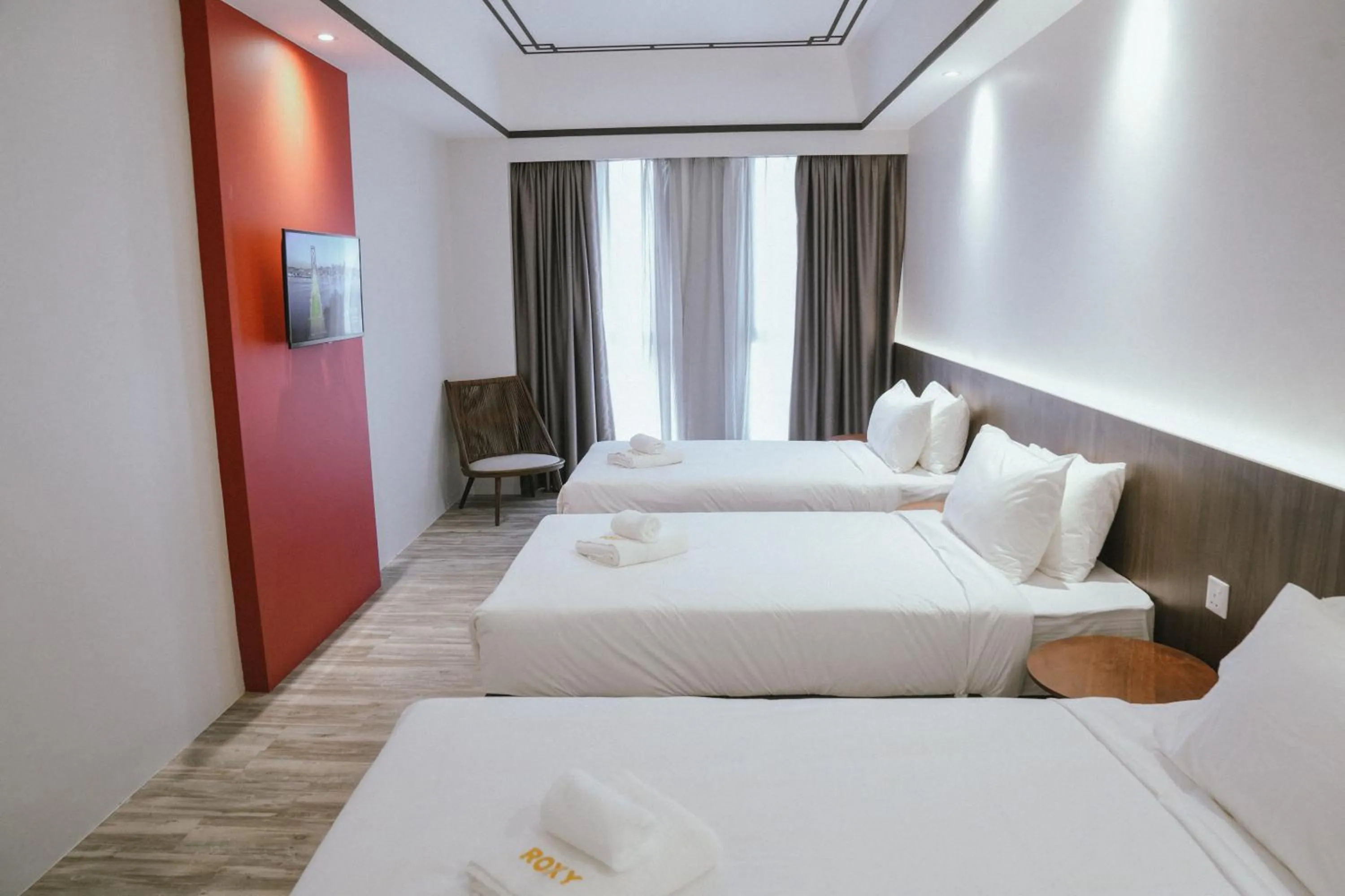 Bed in Roxy Hotel Siniawan