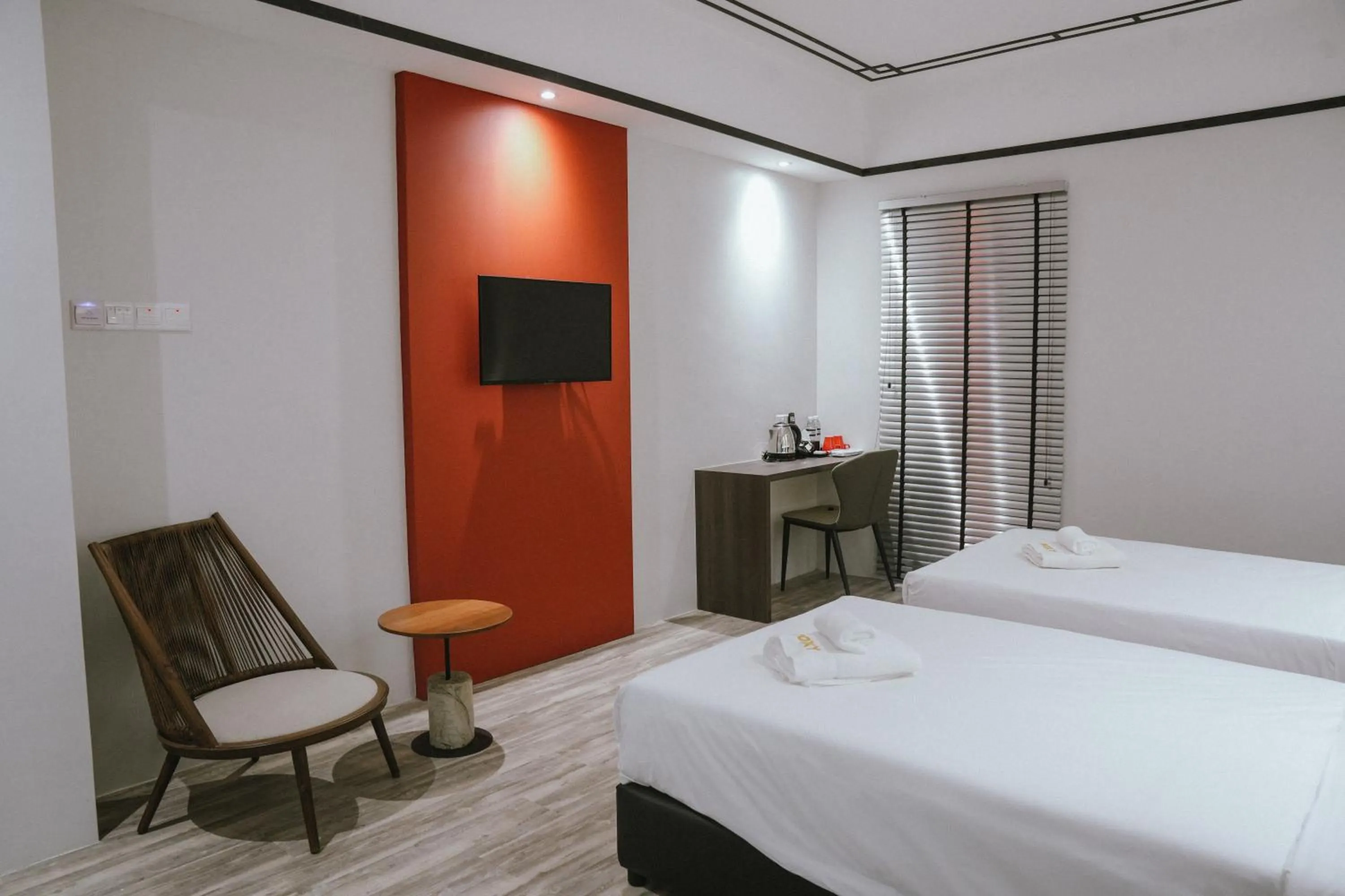 Bed in Roxy Hotel Siniawan