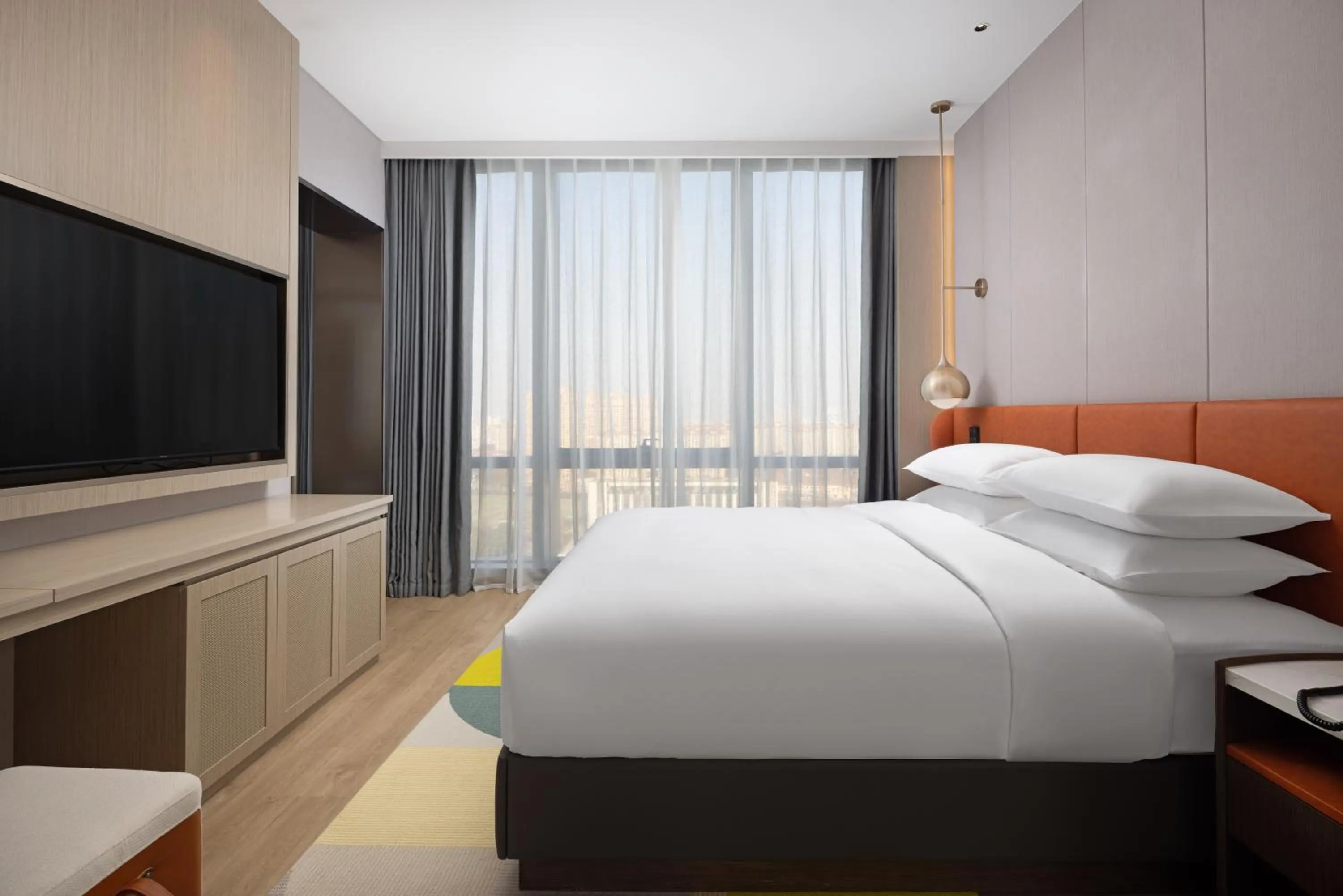 Bed in Home2 Suite by Hilton Jingjiang Binjiang New Town