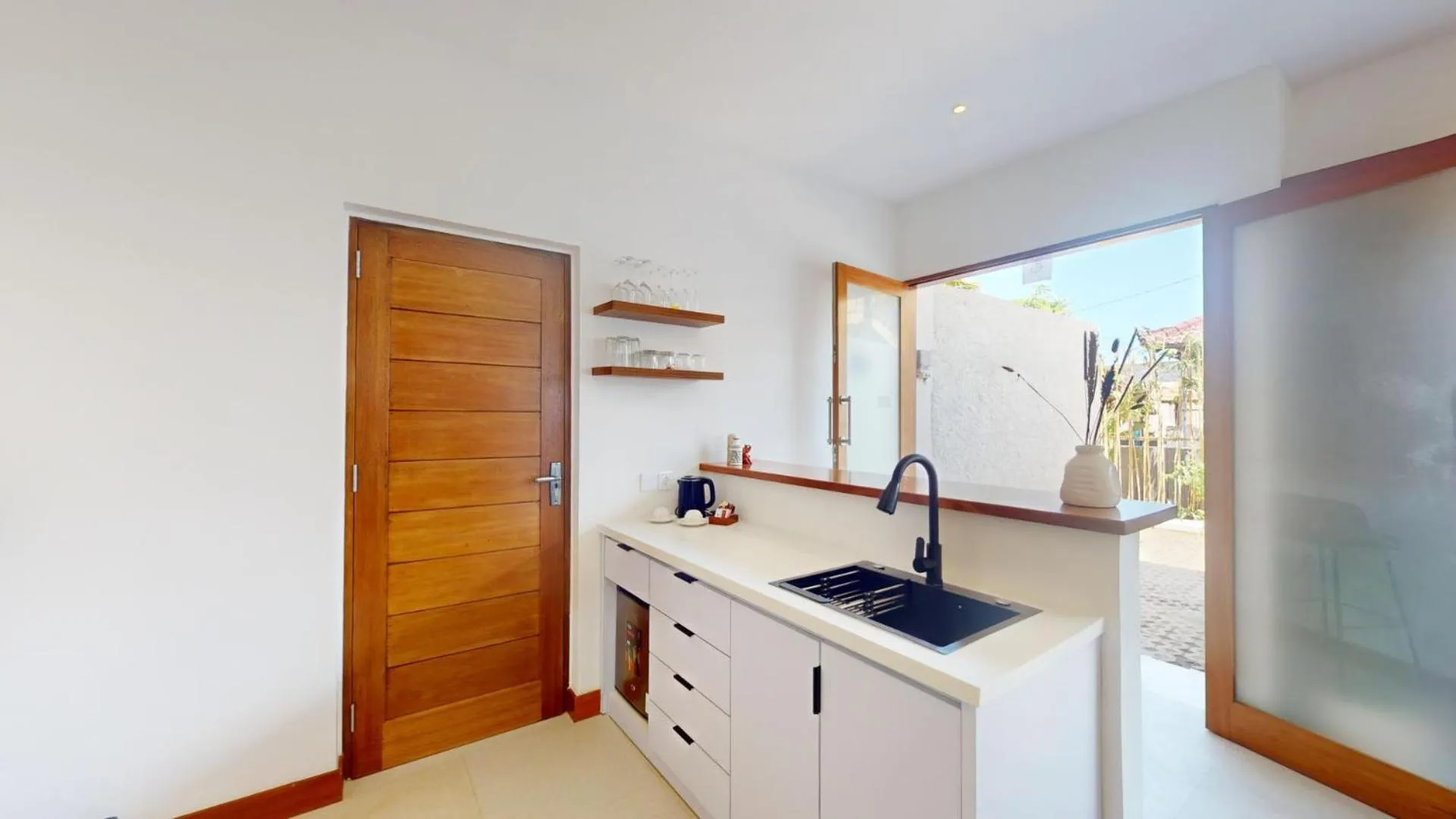 Kitchen or kitchenette in Segara Seaside Resort