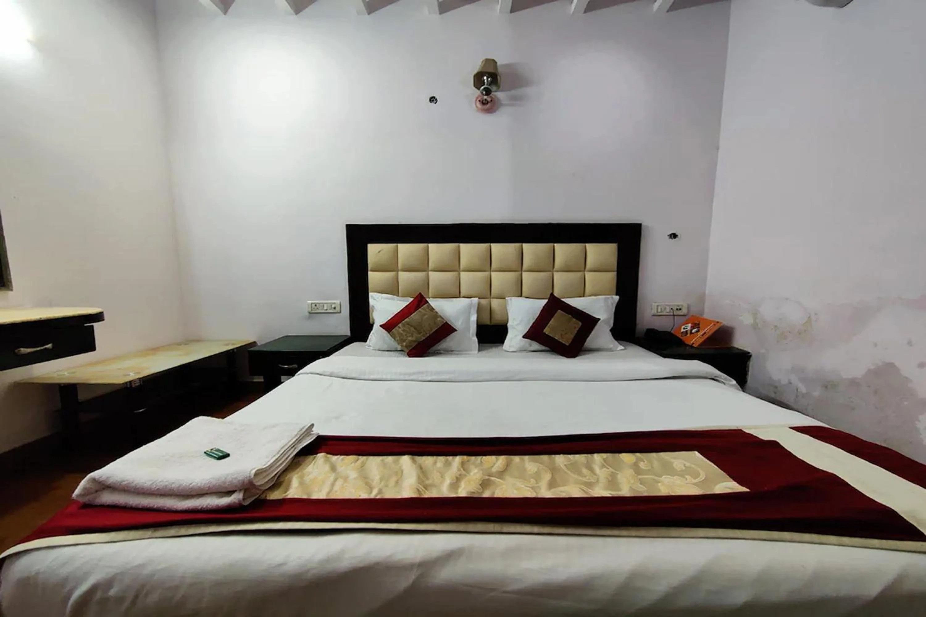 Bed in Hotel Asko International