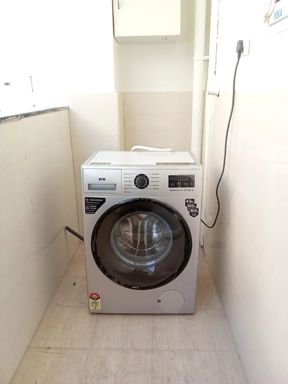 washing machine in Enkay Service Apartments