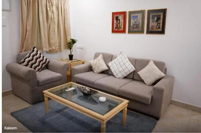 Living room in Enkay Service Apartments