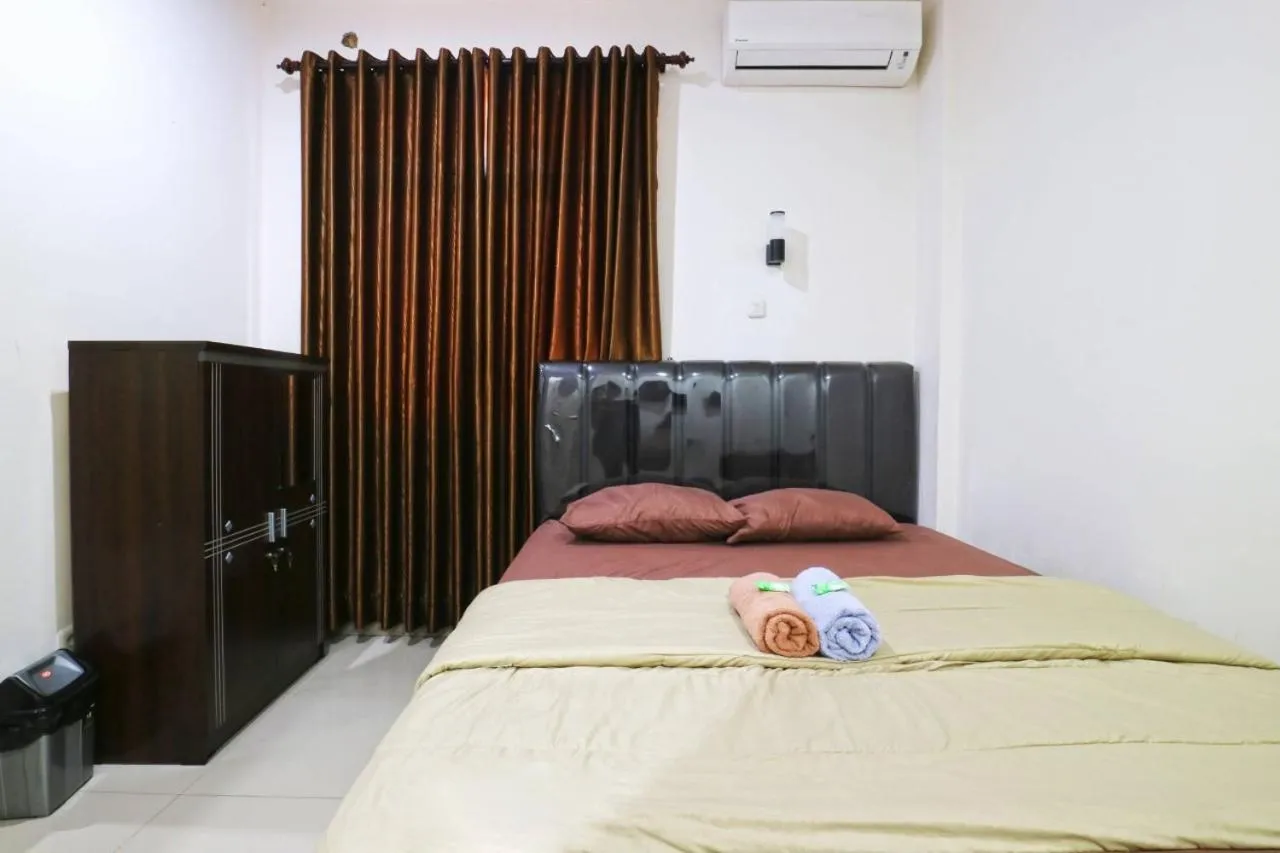 Bed in Saloka Guest House & Residence