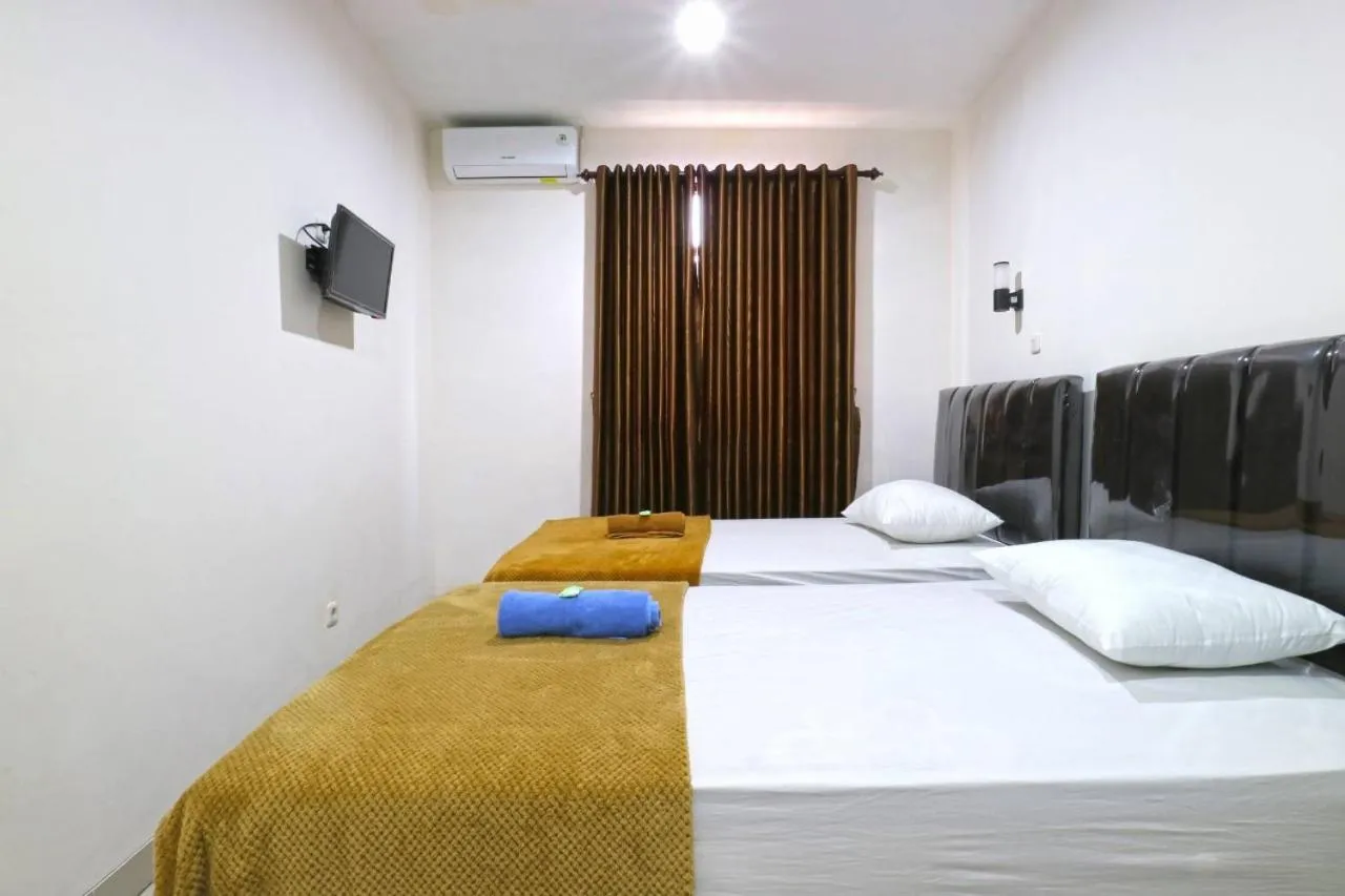 Bed in Saloka Guest House & Residence