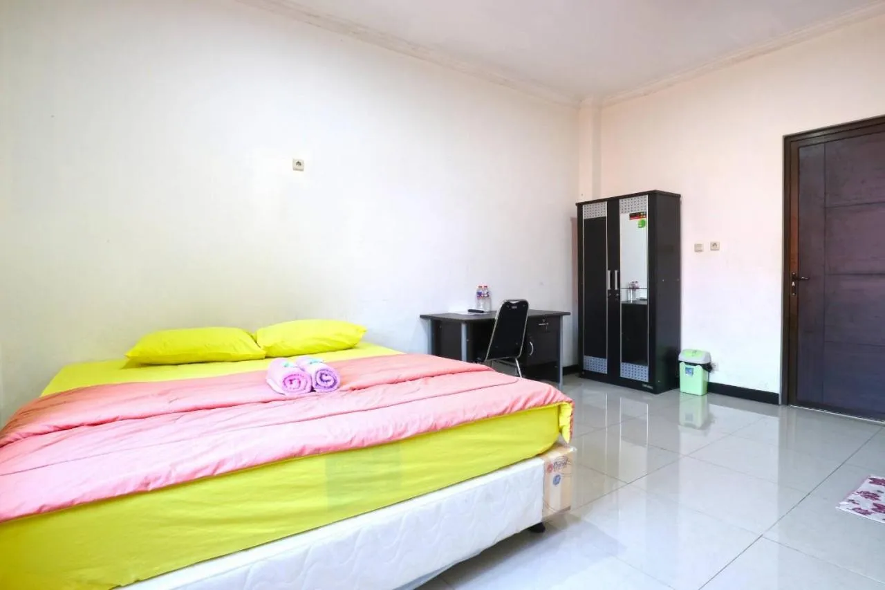 Bed in Saloka Guest House & Residence