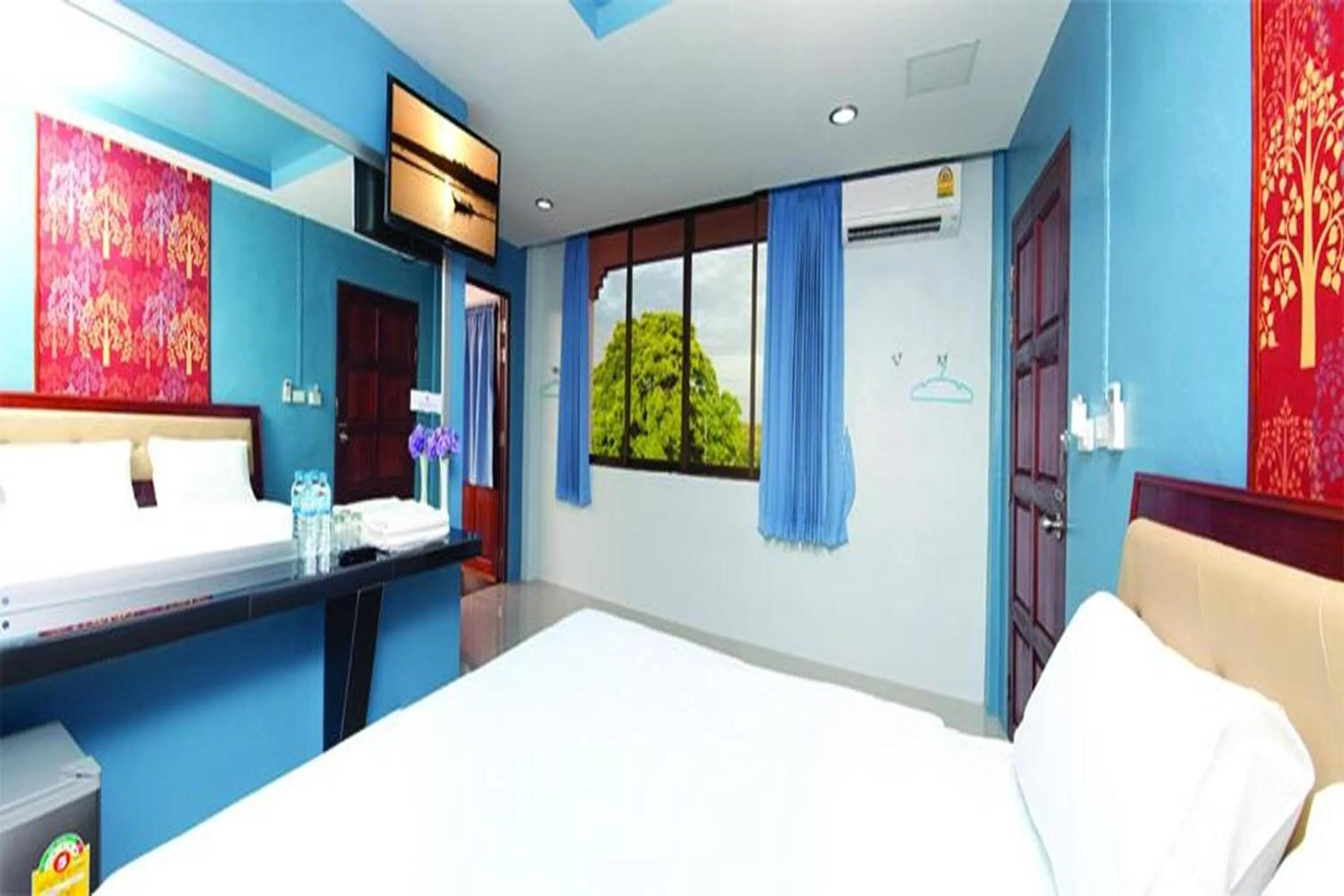 Bed in Krabi Orchid Hometel